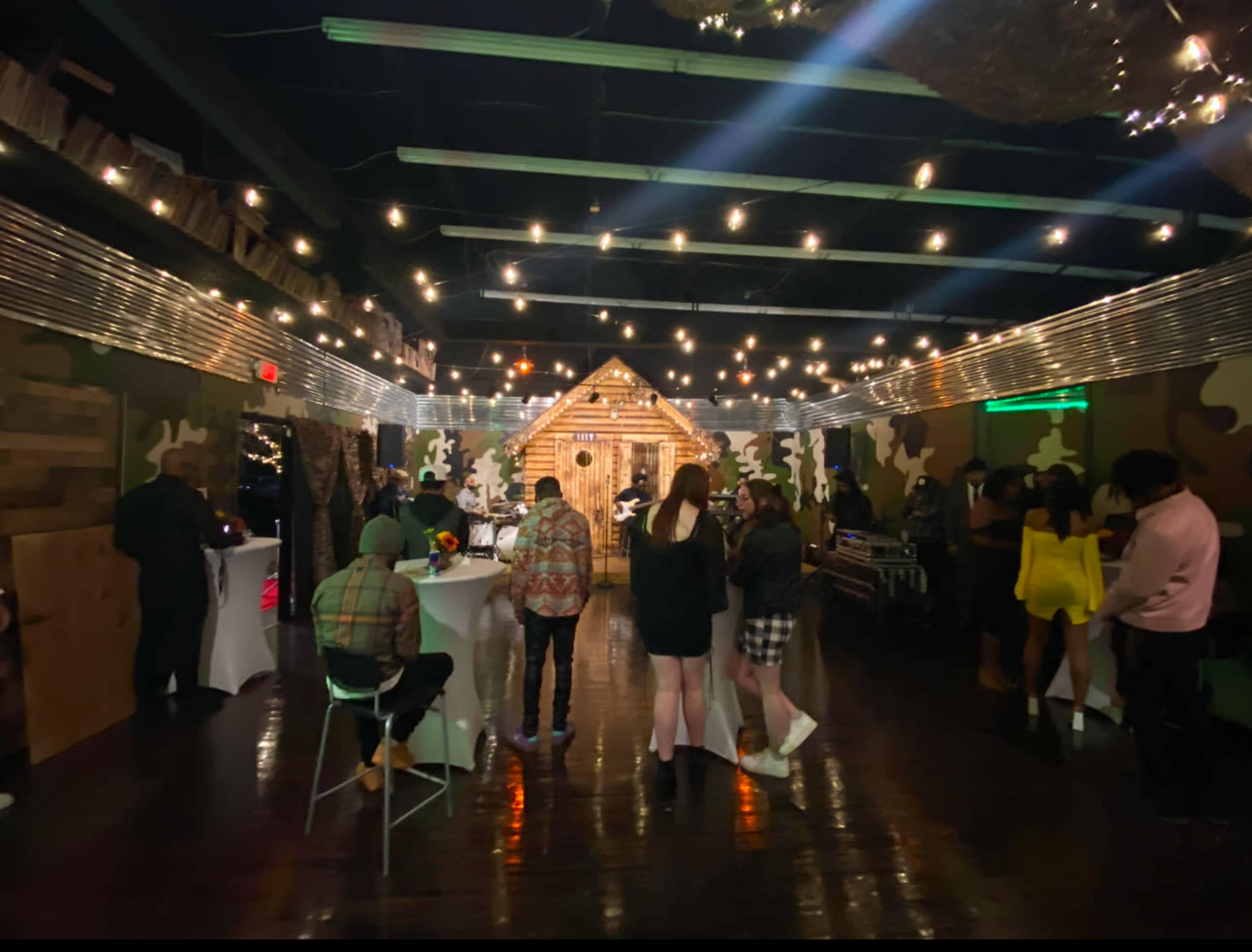 Indoor/Outdoor Ambience, prop log cabin with porch/stage, venue Image in Winston-Salem, Winston-Salem, NC