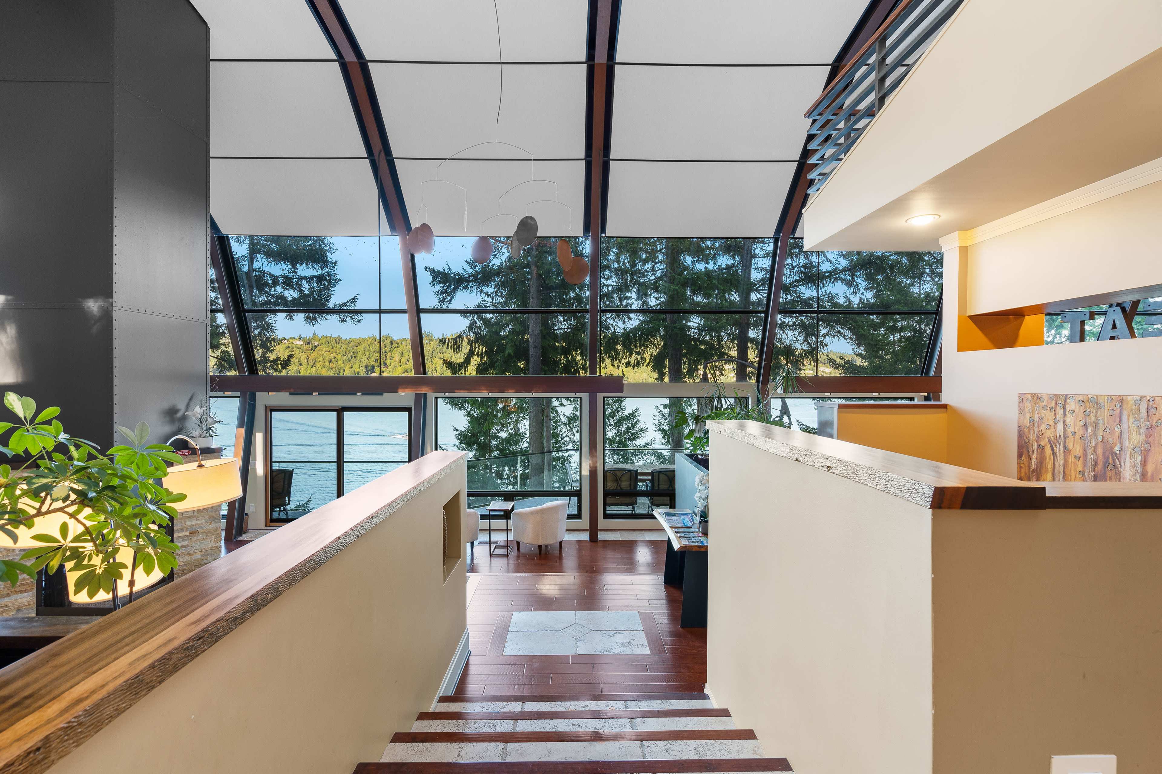 Glass house on Lake Sammamish with private dock Image in Viewpoint, Redmond, WA