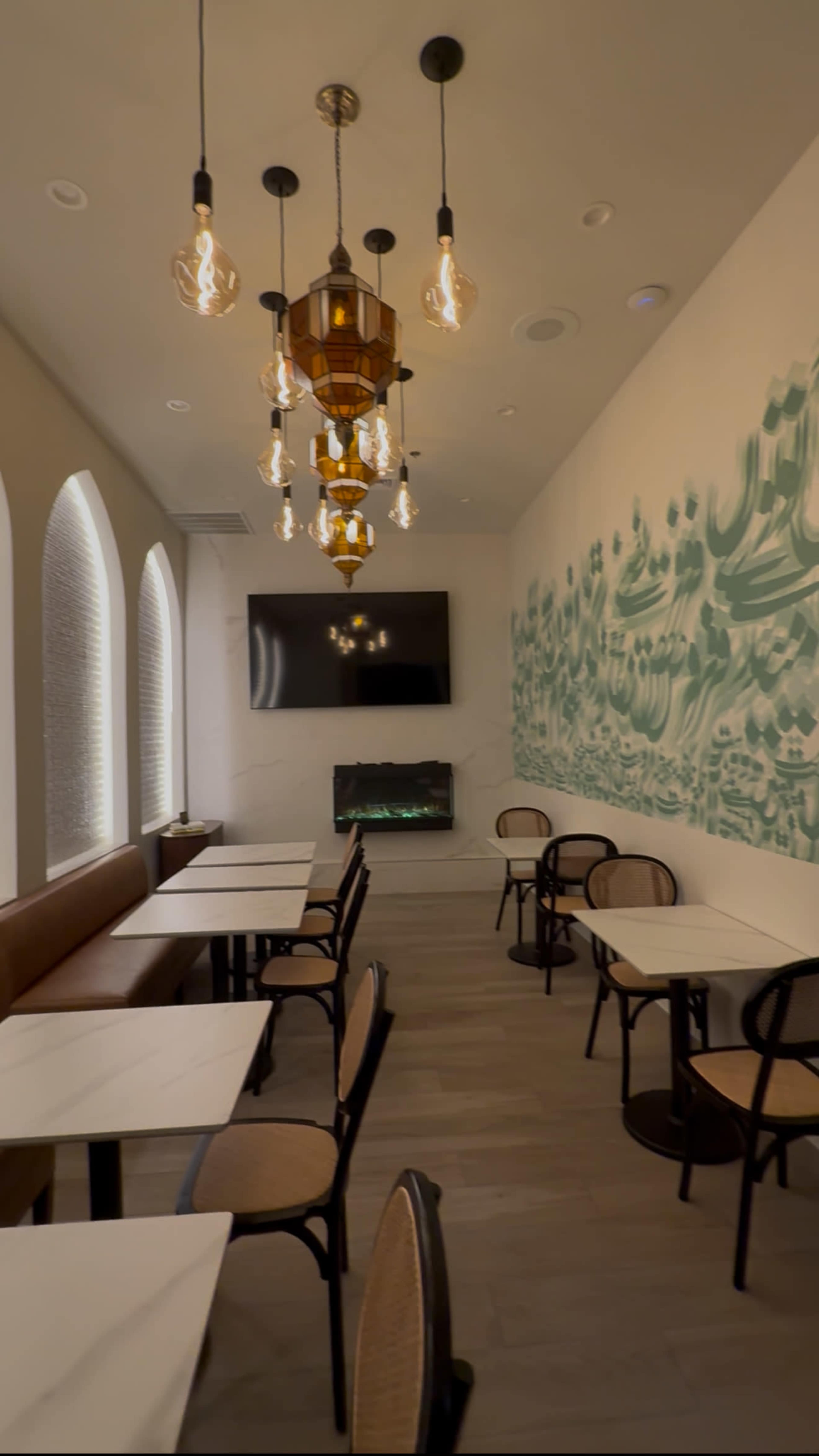 Warm, Luxurious Private Room with Cultural Murals in a Cafe Image in North Philadelphia, Philadelphia, PA