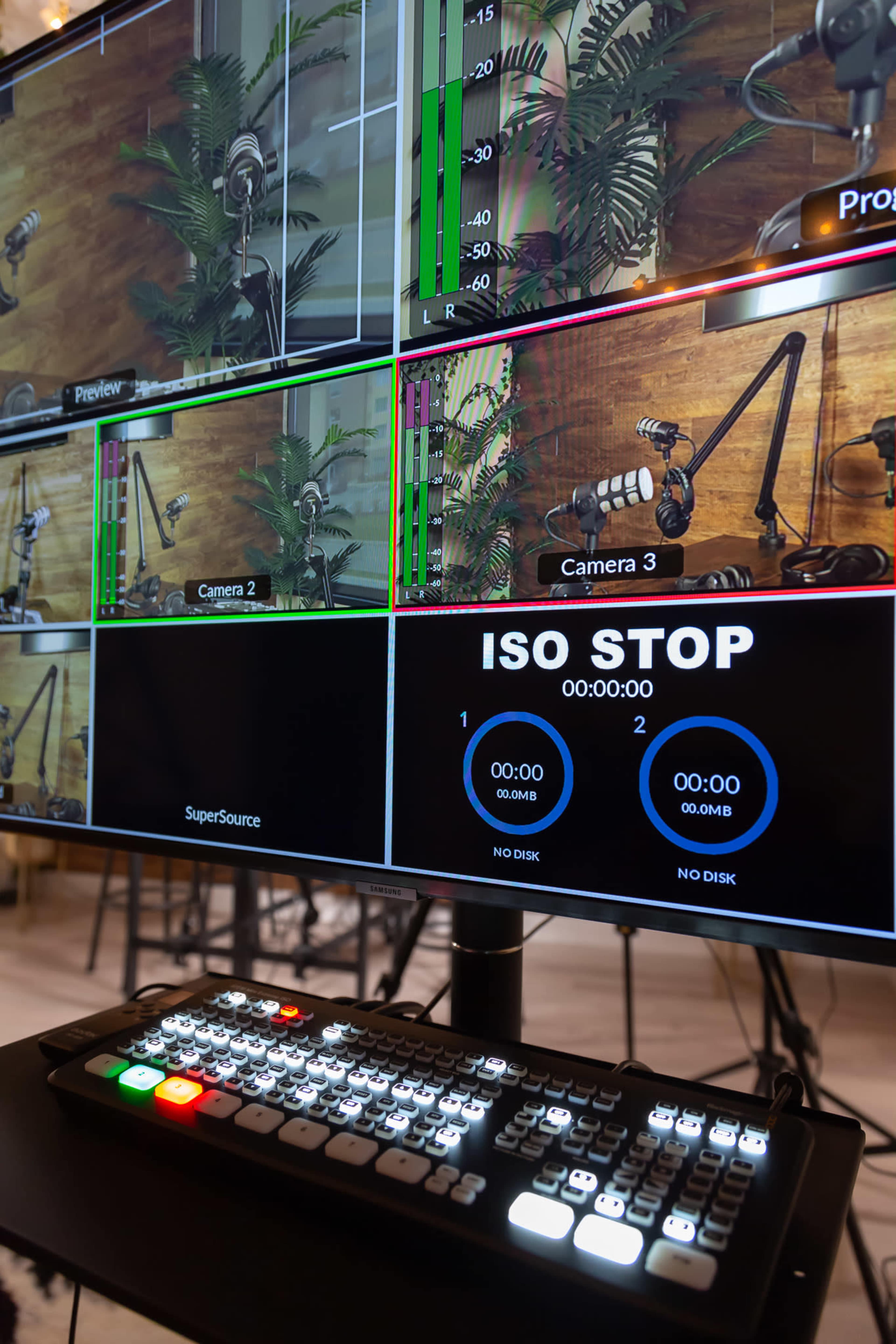 A multi-camera video production setup on a monitor displaying various camera feeds and control settings.