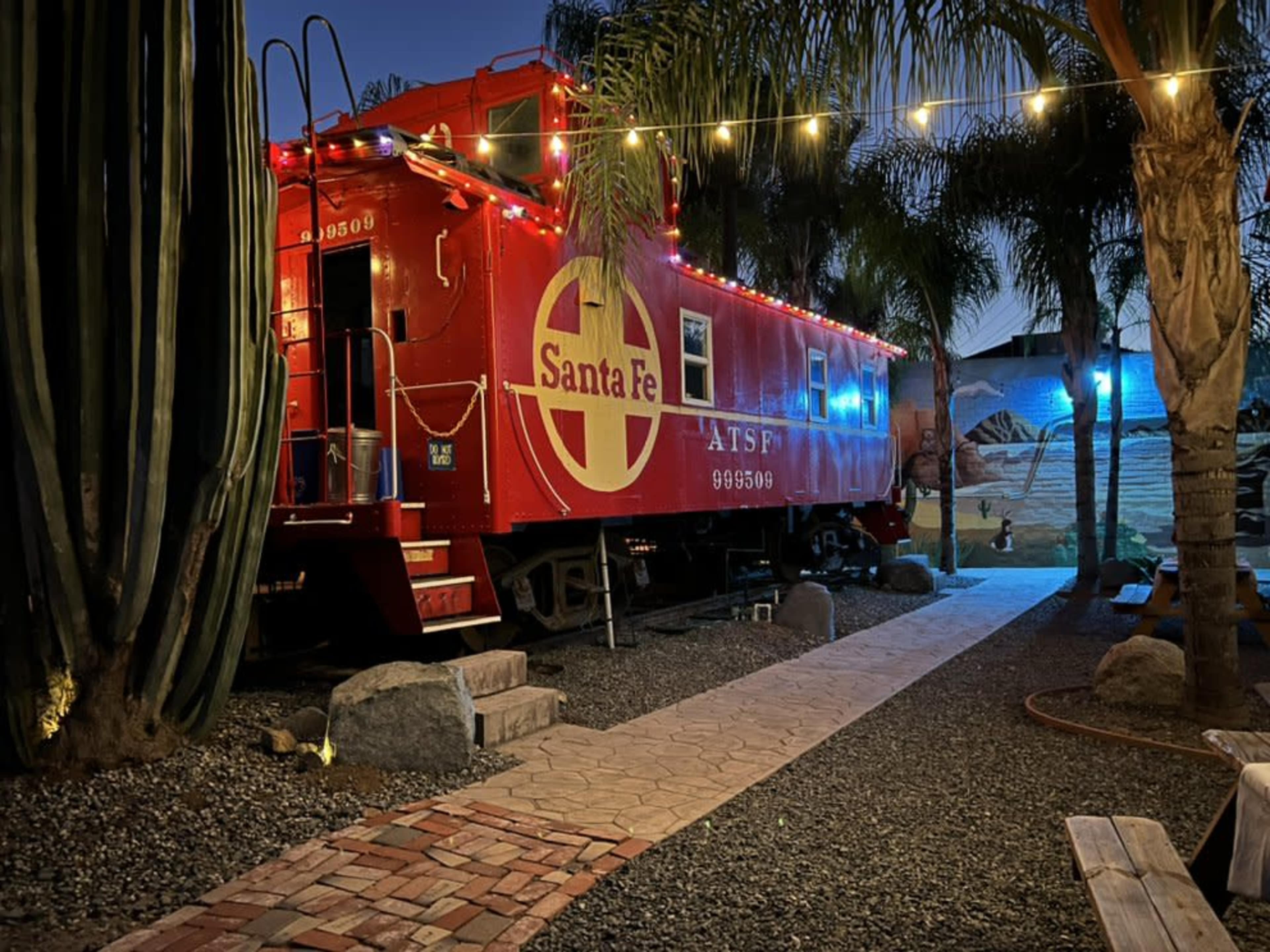Vintage Train Caboose with Cafe Patio and Fenced Yard Image in , Flinn Springs, CA