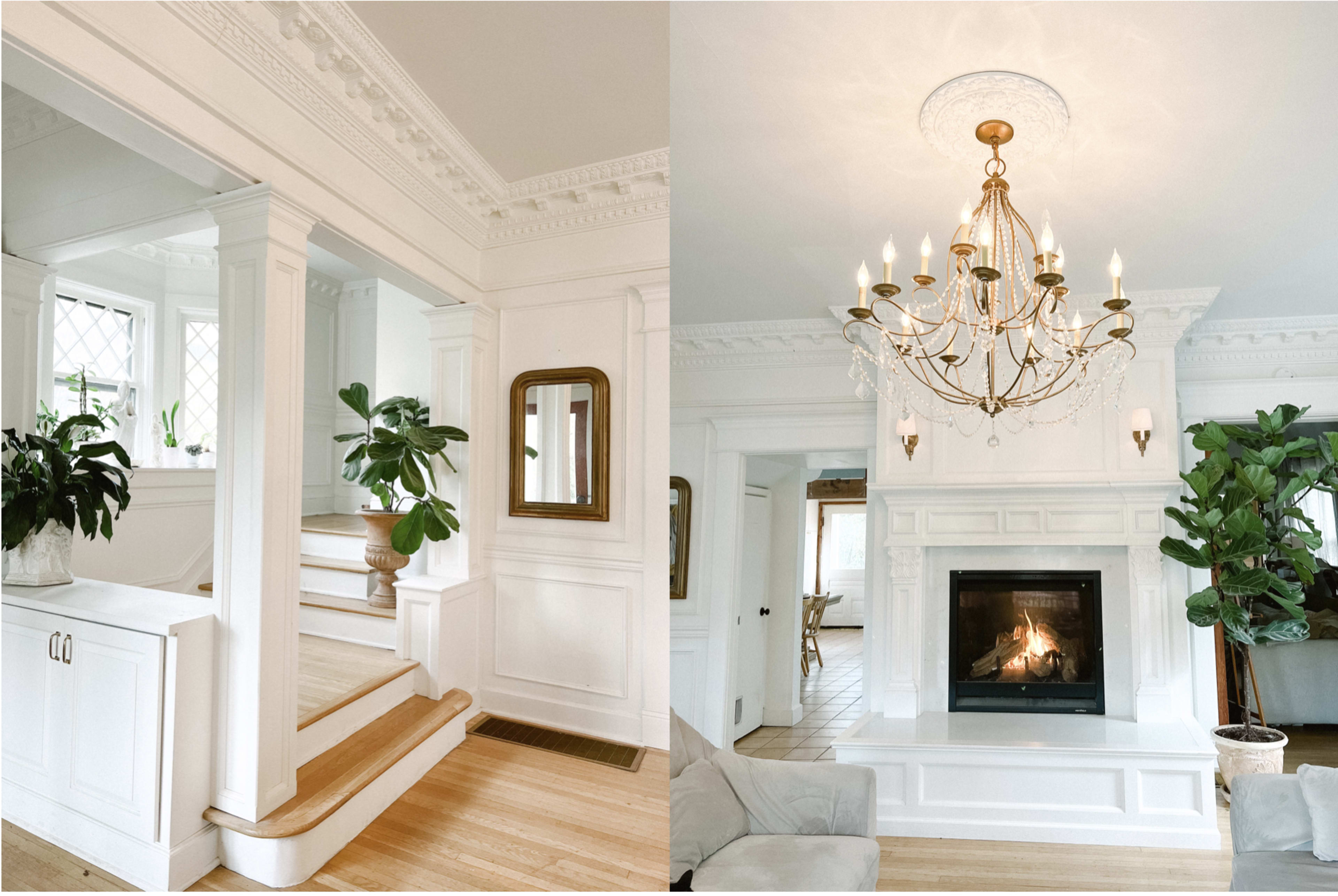 A bright interior featuring a staircase with a wooden handrail on the left and a fireplace with a chandelier above on the right.