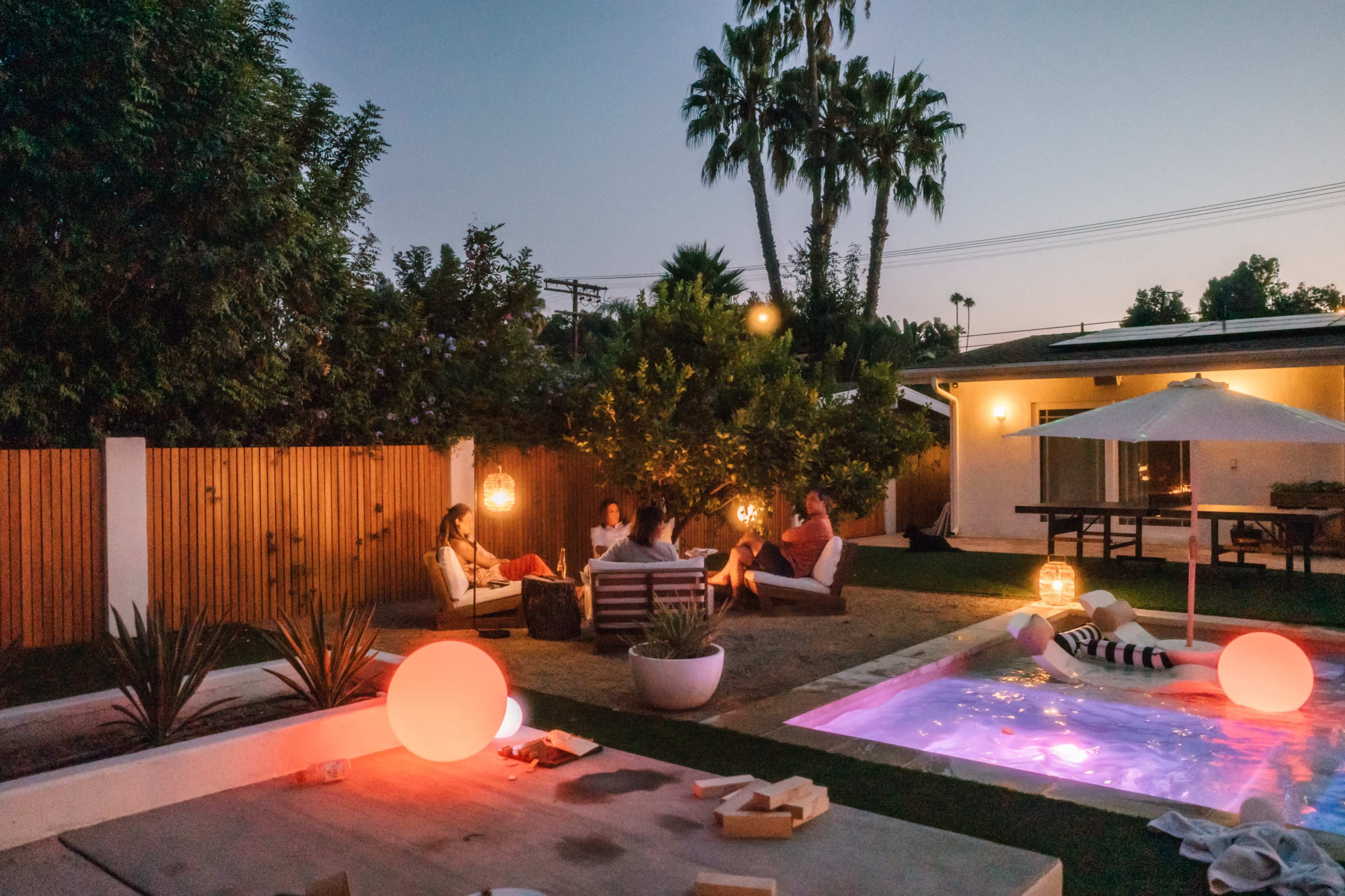 Resort-Style Backyard with Pool, Pergola, Firepit & Outdoor Kitchen Image in Woodland Hills, Woodland Hills, CA