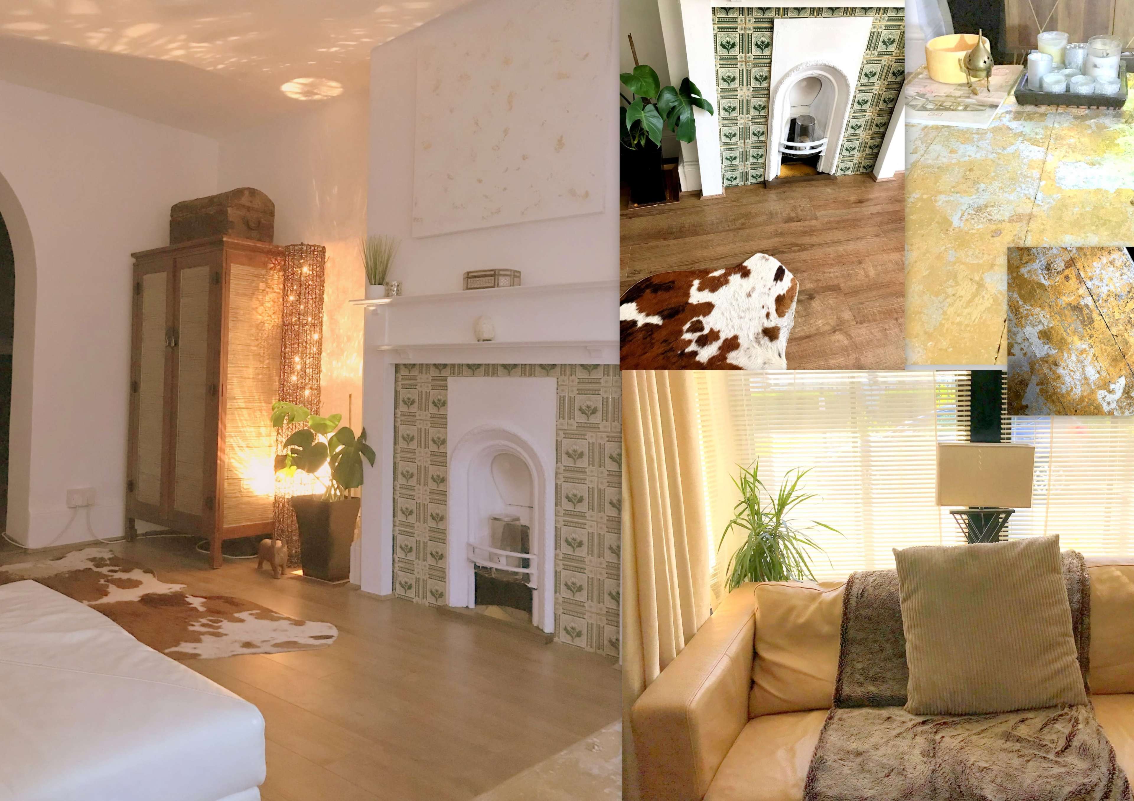 A cozy living room with a decorative fireplace, a cowhide rug, and various furnishings, including plants and a couch.