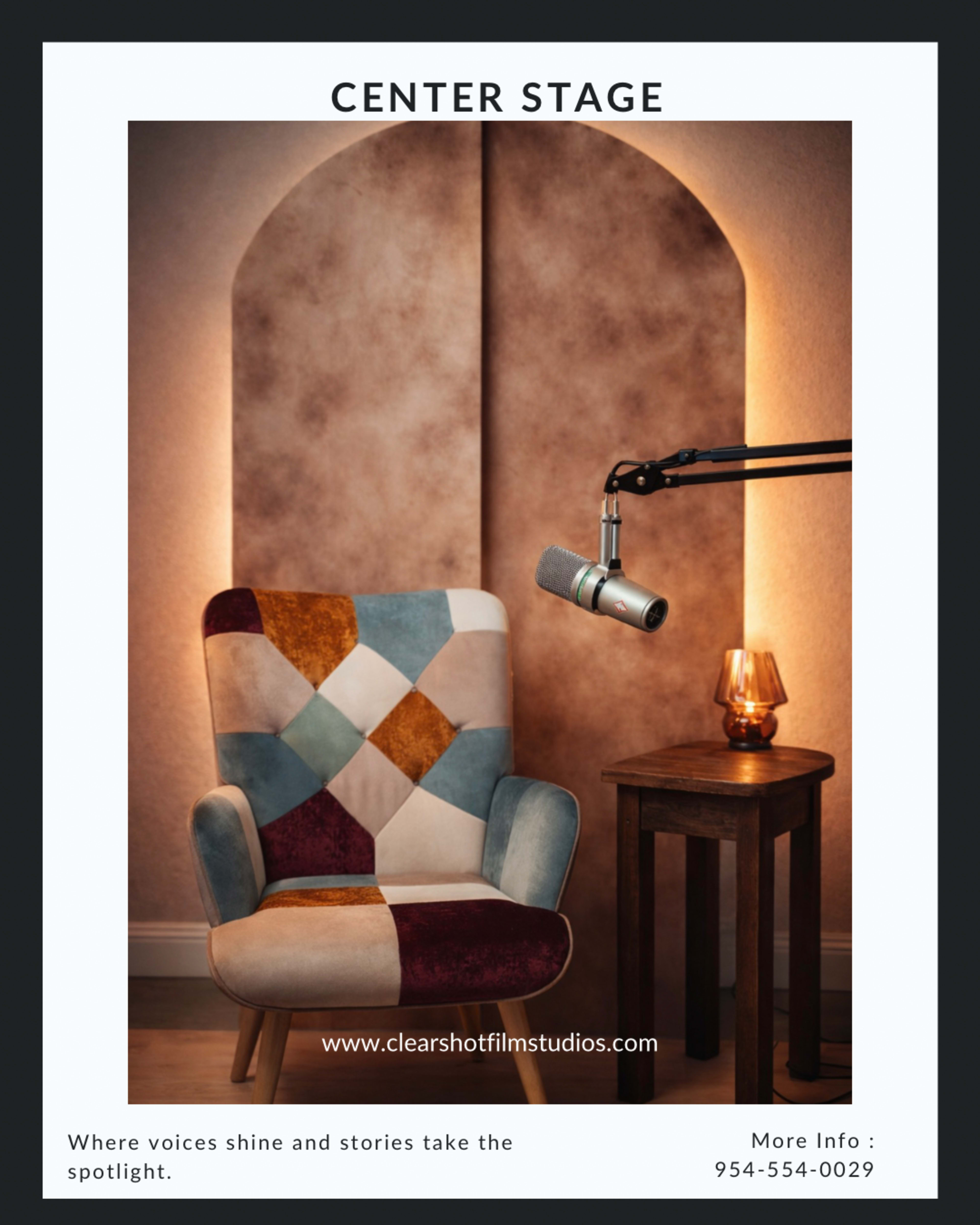 The image shows a stylish chair with a patchwork design next to a small wooden table, illuminated by soft lighting with a microphone mounted nearby.