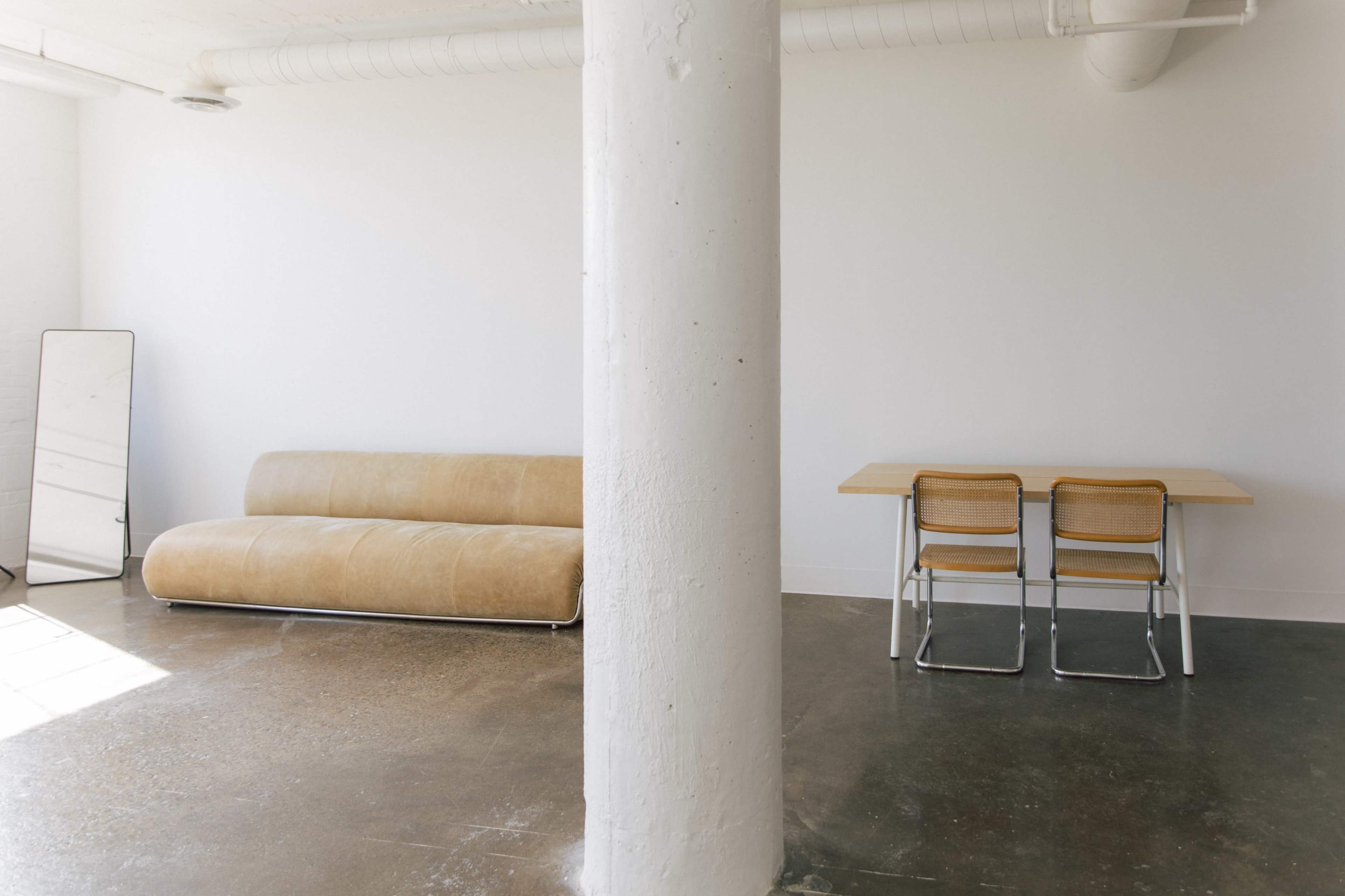 Modern Sunny Natural Light Photo Studio with City View Image in Near North, Minneapolis, MN