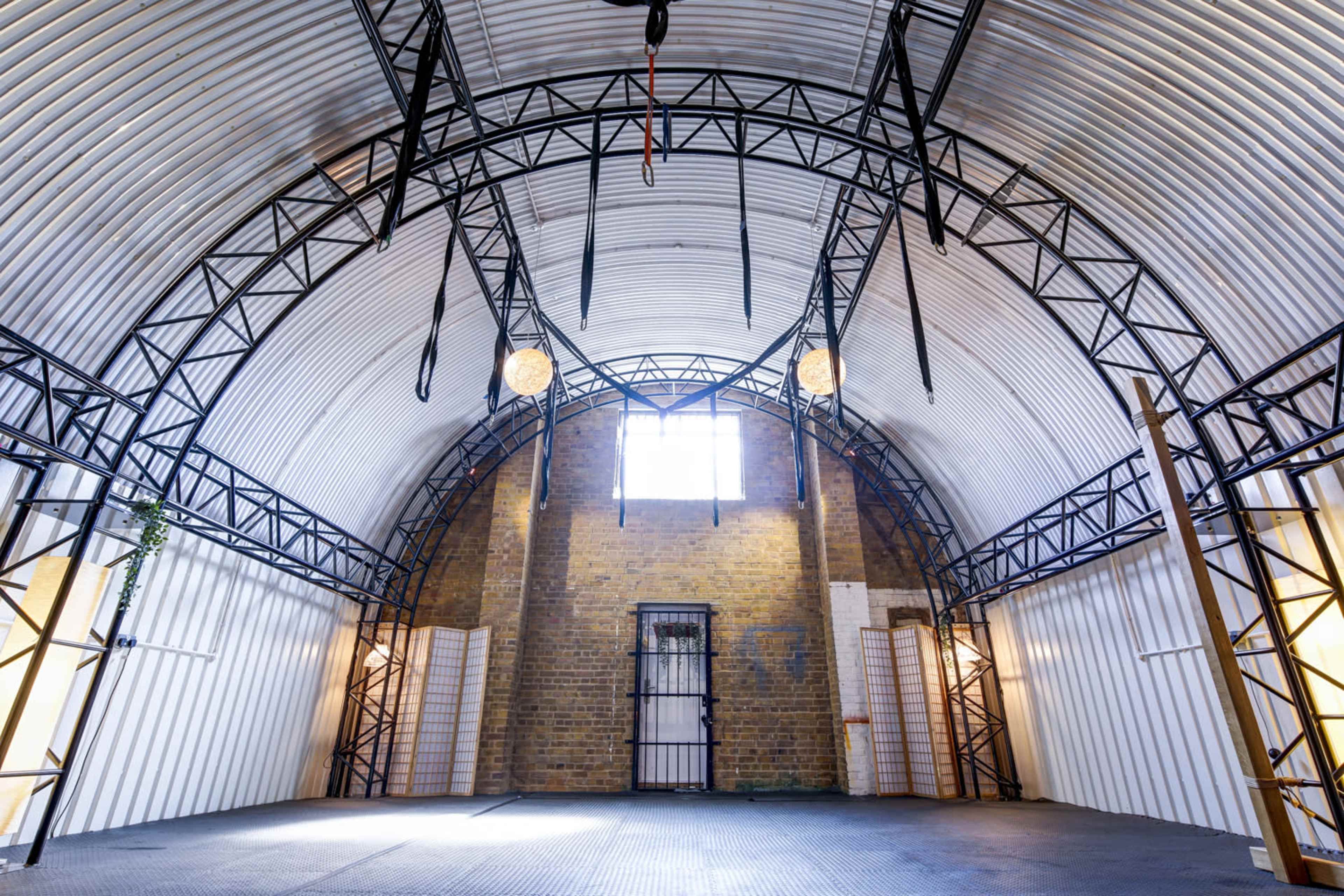 Industrial Railway Arch with matted floor Image in Peckham, London, ENG