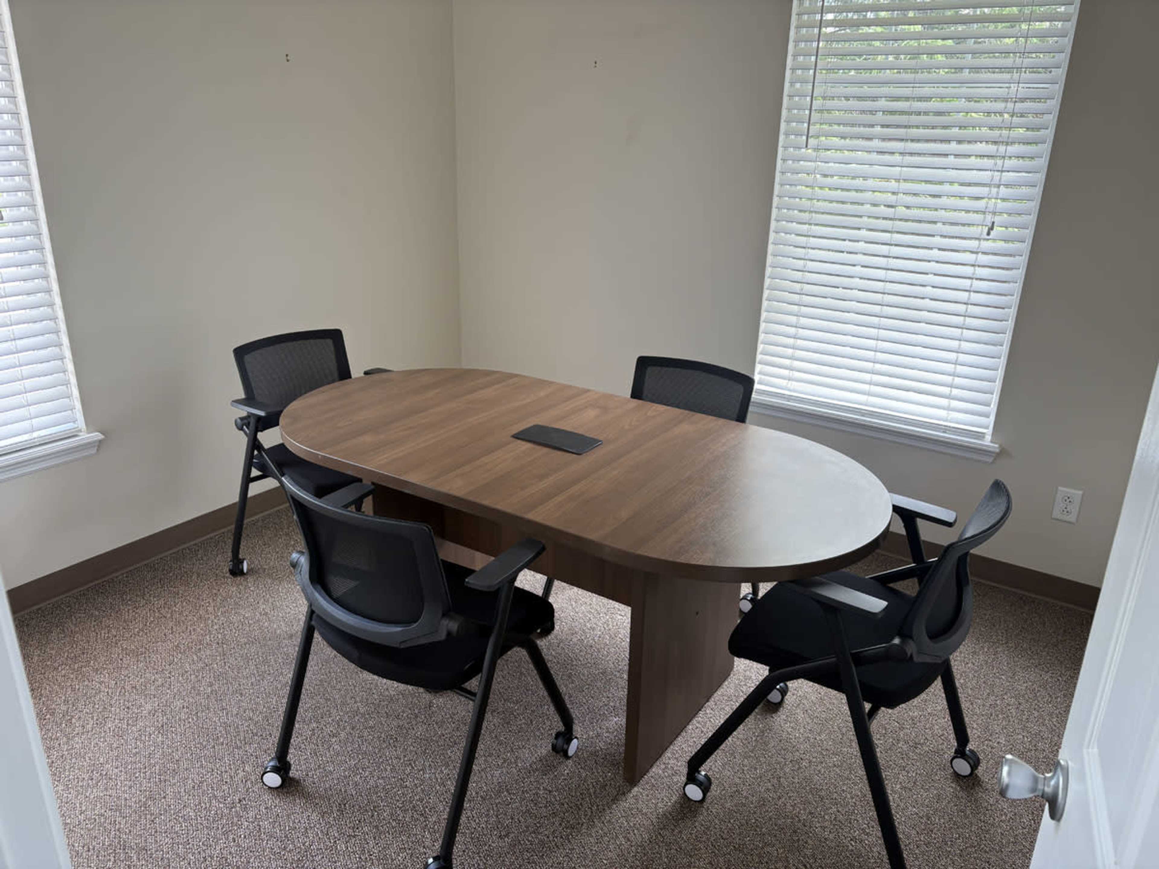 Small boardroom-style conference room in St. Peters, MO. Image in O'Fallon Township, St. Peters, MO