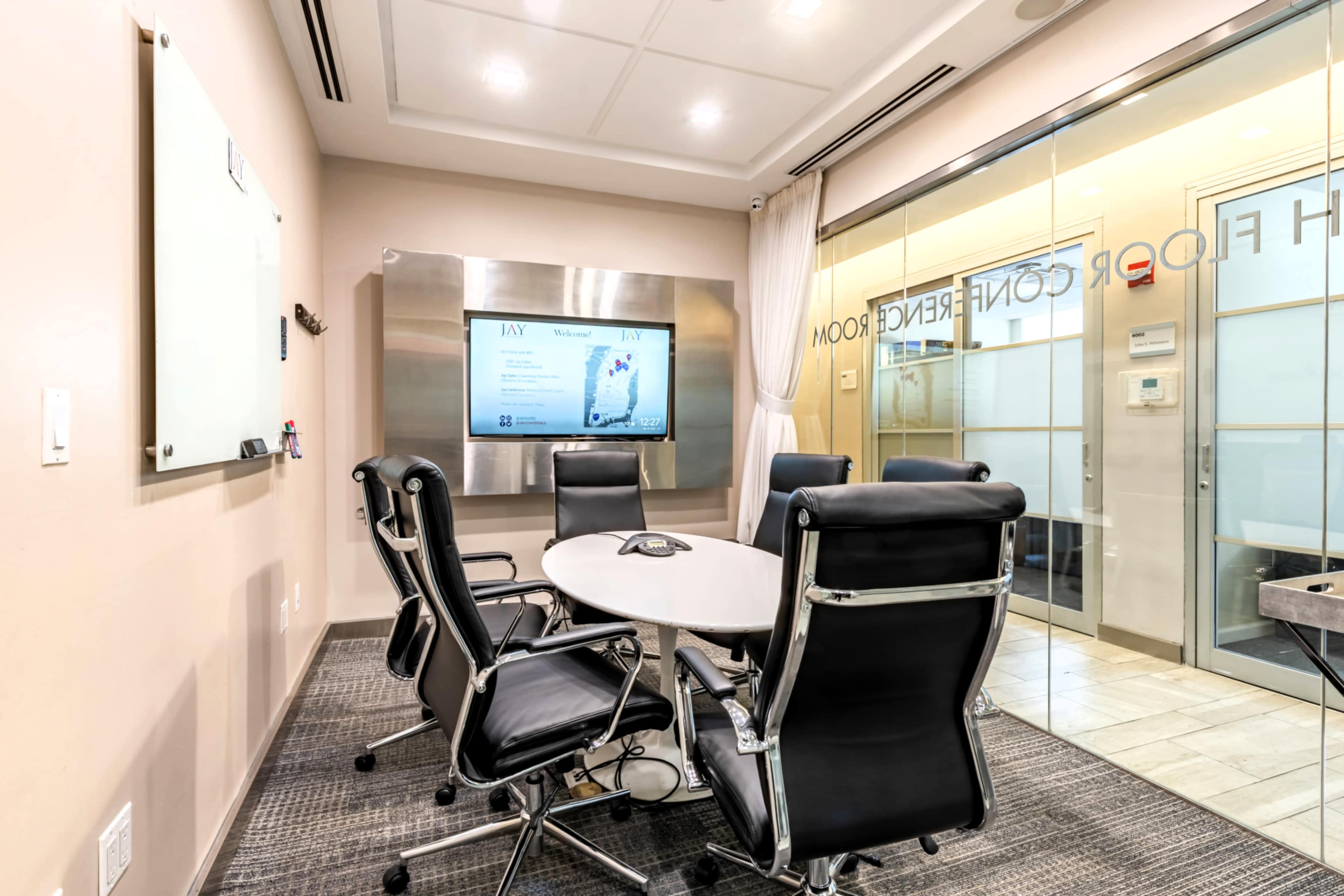 Ultra Modern Glass Enclosed 4th Floor Meeting Room for 6 People - MA - Limited Time 50% Off Image in Murray Hill, New York, NY