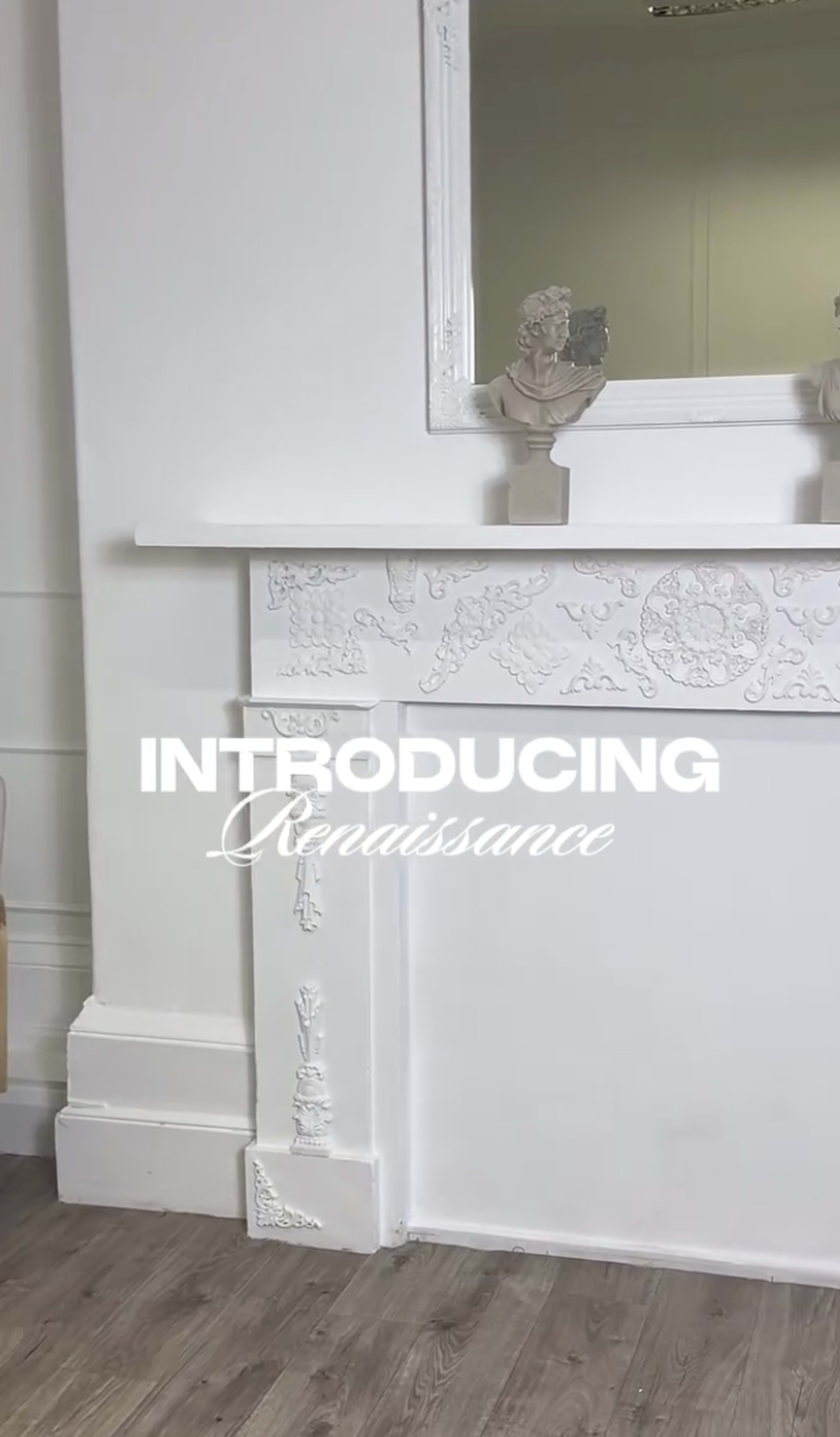 The image features a white mantelpiece with decorative carvings and a mirror above it, set against a minimalist background.