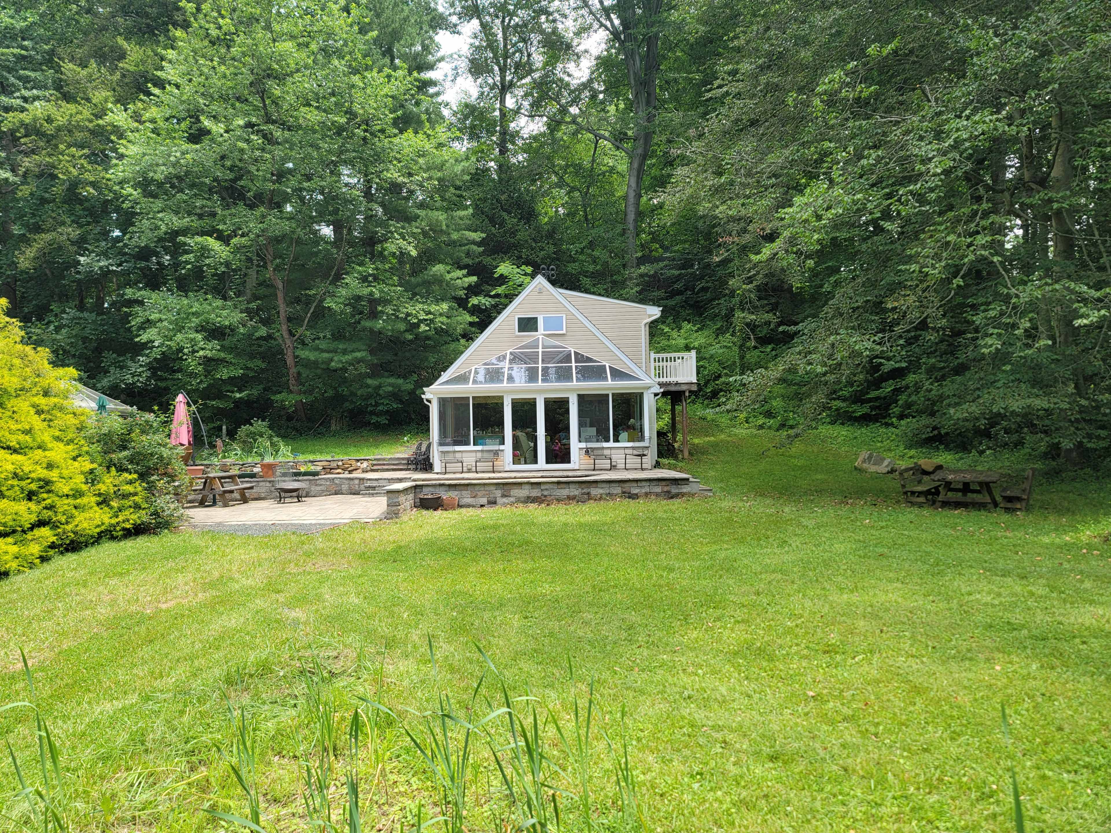 Perfect Outdoor Photography backdrop - Creekside grassy knoll under the shade of trees Image in Kingsville, Kingsville, MD