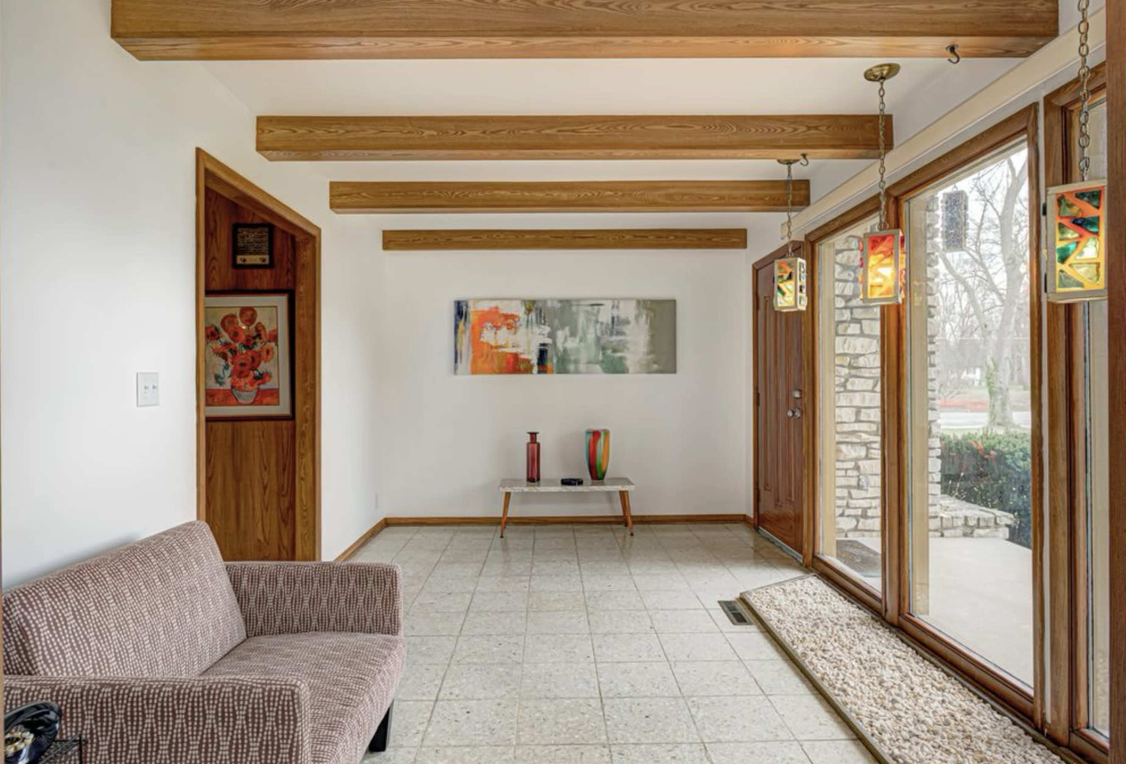 Mid-Century Modern home with original interiors and vintage furnishings. Image in Devon, Indianapolis, IN