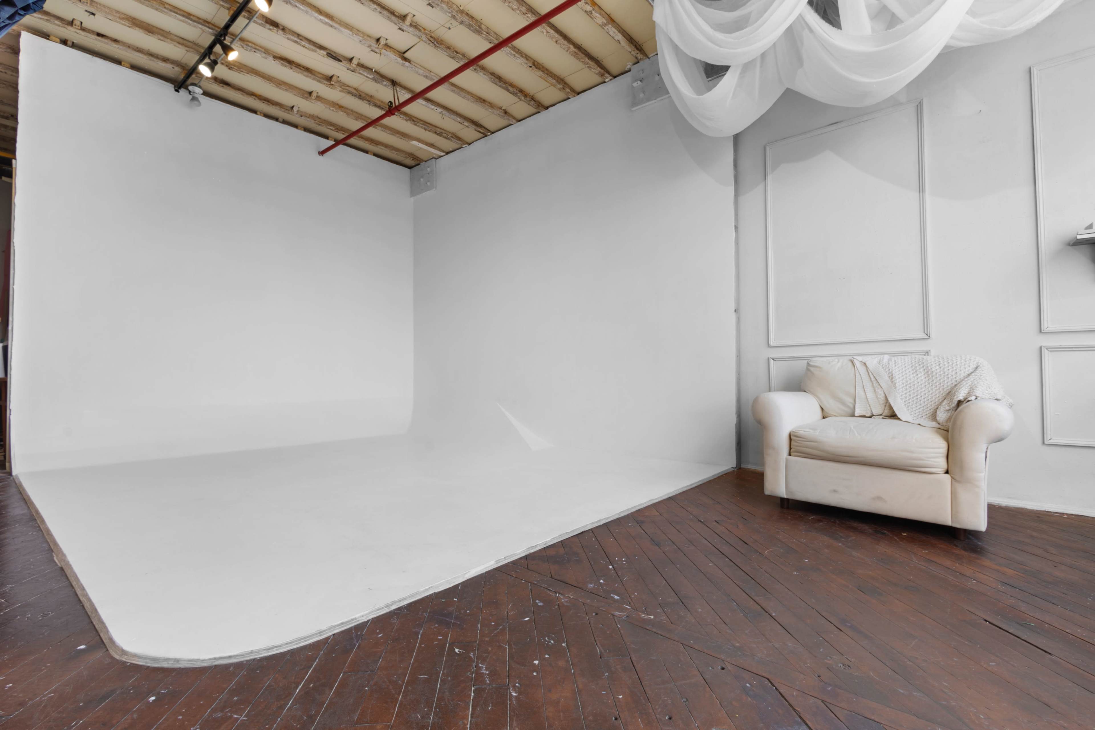 Photo and video studio rental. 750 sq ft space with 12' ceilings located on the edge of a vibrant area of Brooklyn, Industry City. Multiple stages & cyc wall. Equipment & props are included. Image in Sunset Park, Brooklyn, NY