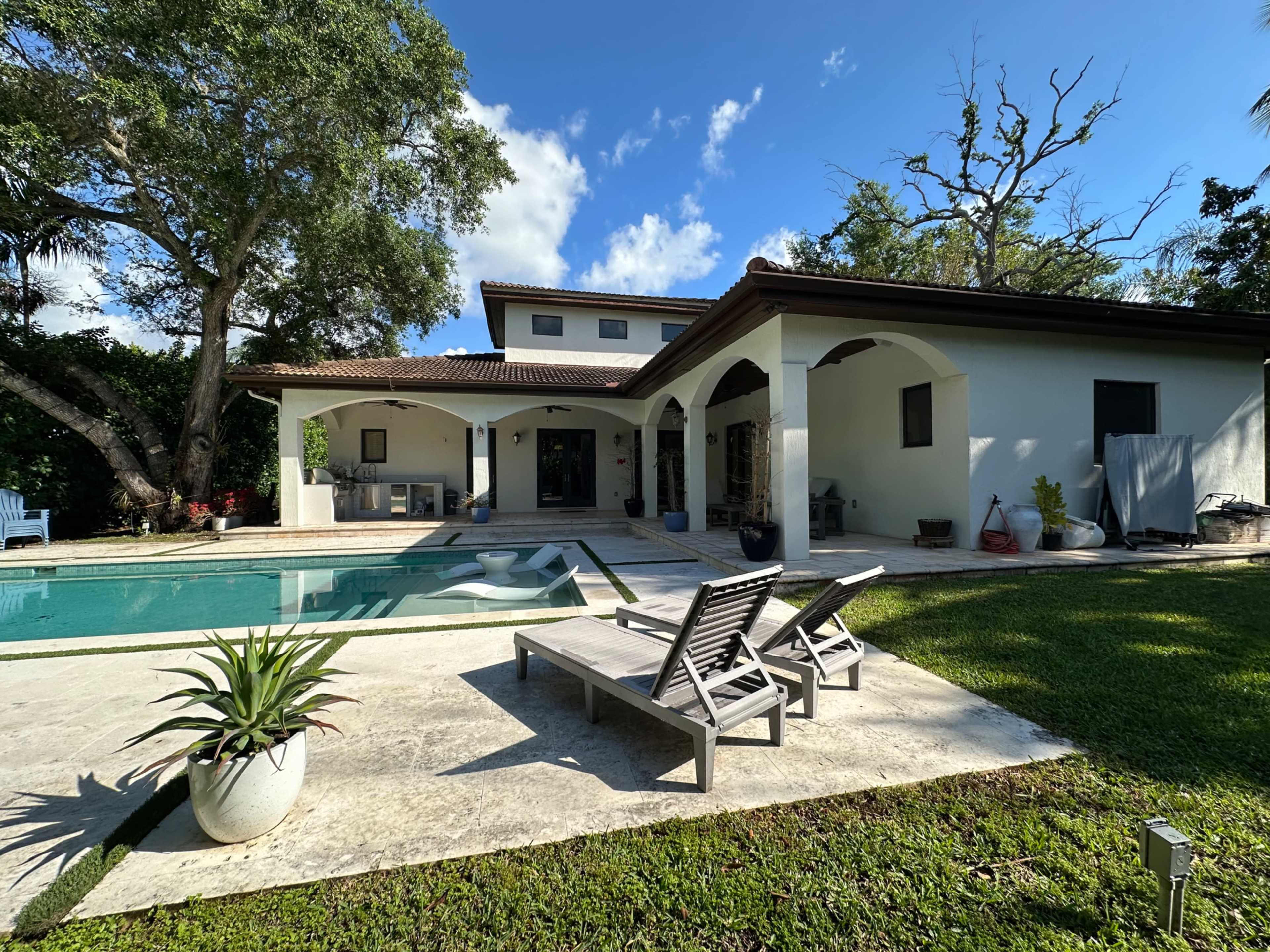 Private Garden Retreat with Pool, Oak Trees & Outdoor Kitchen Image in Glenvar Heights, Miami, FL
