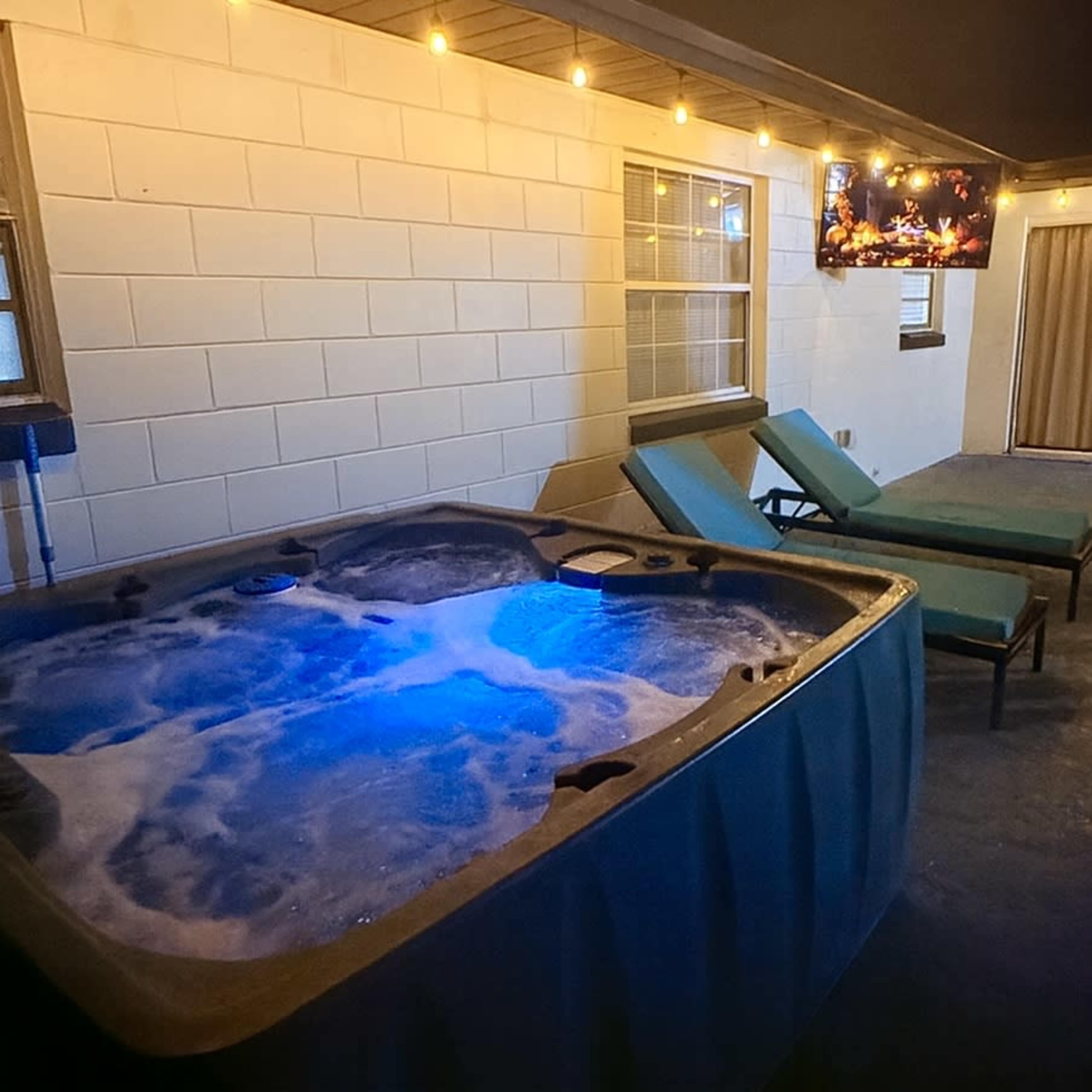 Backyard in a family friendly neighborhood with a RV,  hot tub and TV deck fire pit area Image in Goldenrod, Winter Park, FL