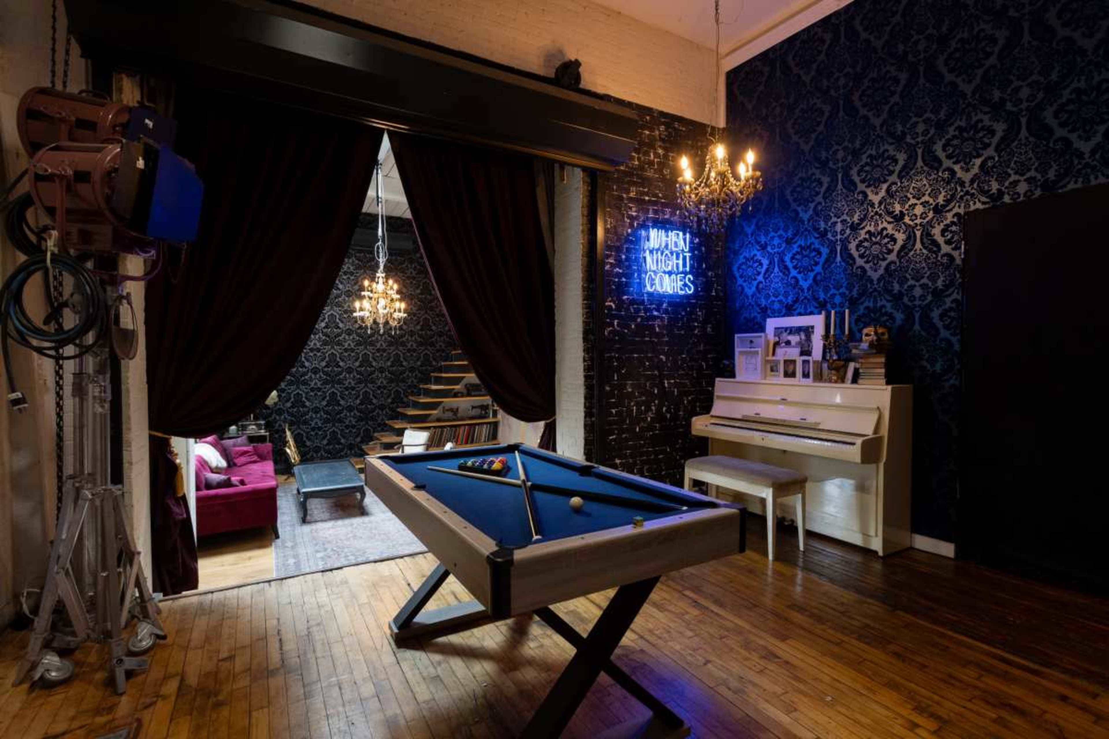 Photo/Video studio with Whitewall, Greenscreen, and vintage speakeasy setting. Image in Bushwick, brooklyn, NY