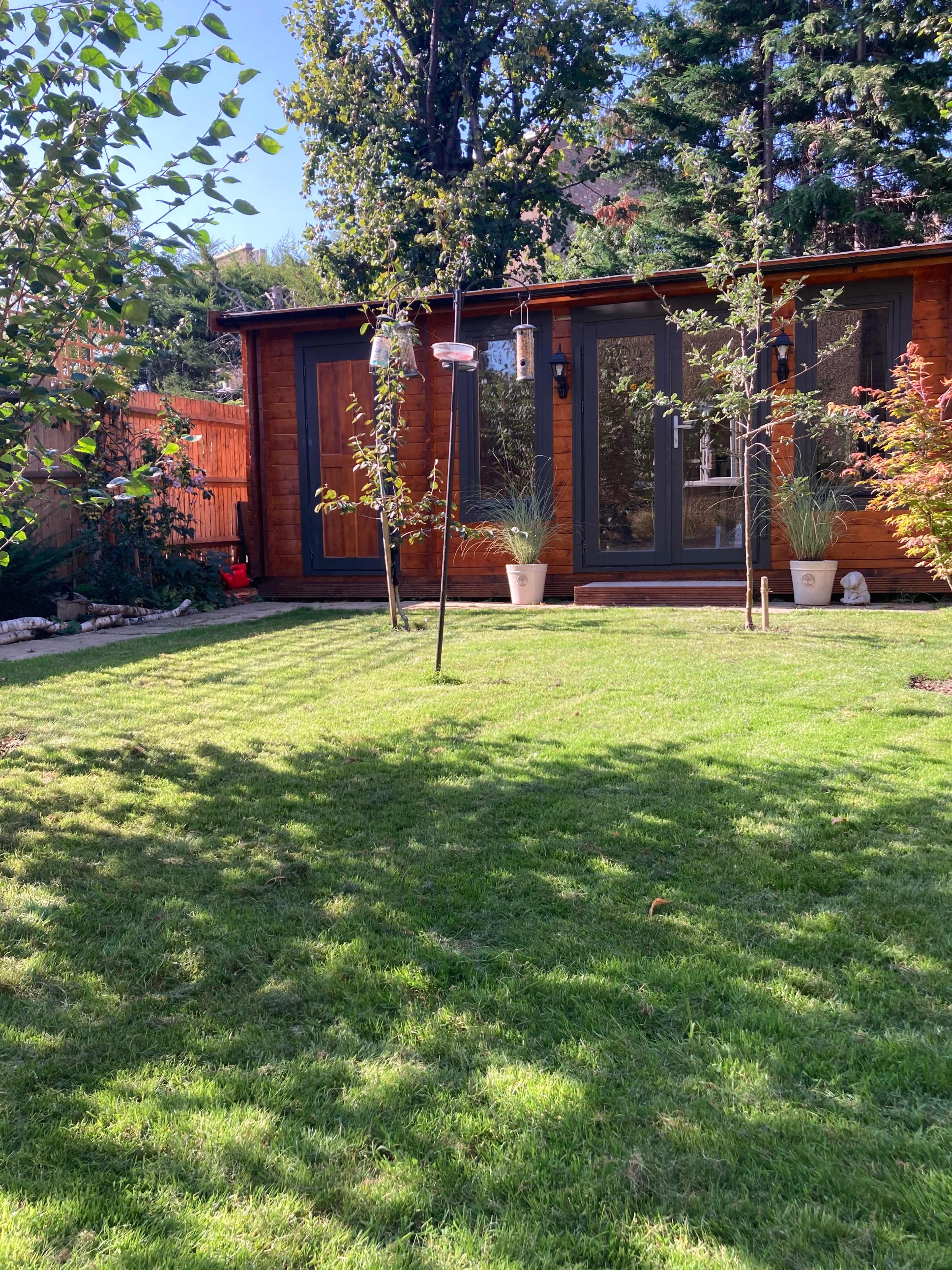 light-filled log cabin with ensuite bathroom Image in Raynes Park, london, ENG