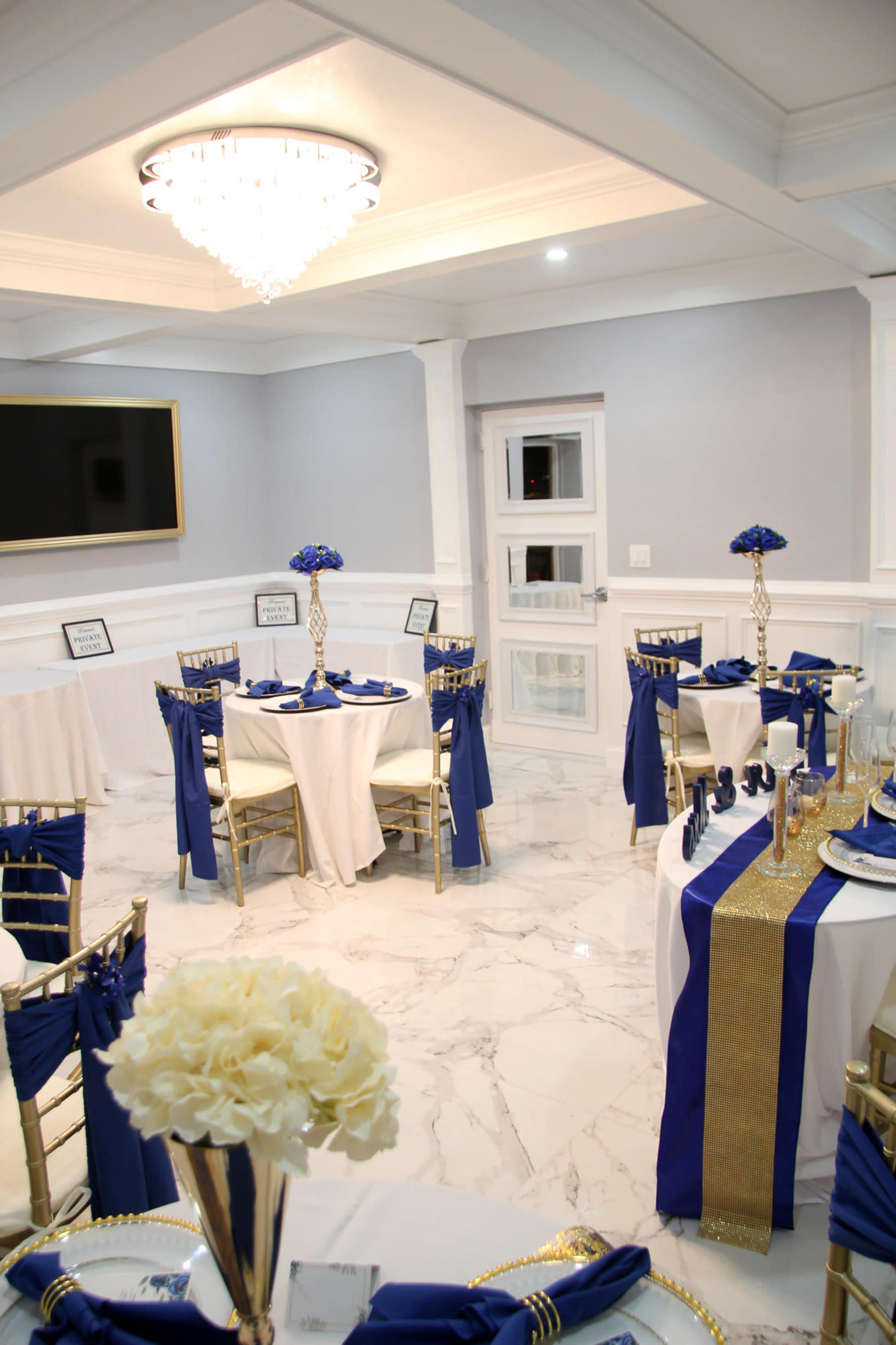 Indoor/outdoor event space with elegant room and private patio along the side of a restaurant. Image in , Decatur, GA