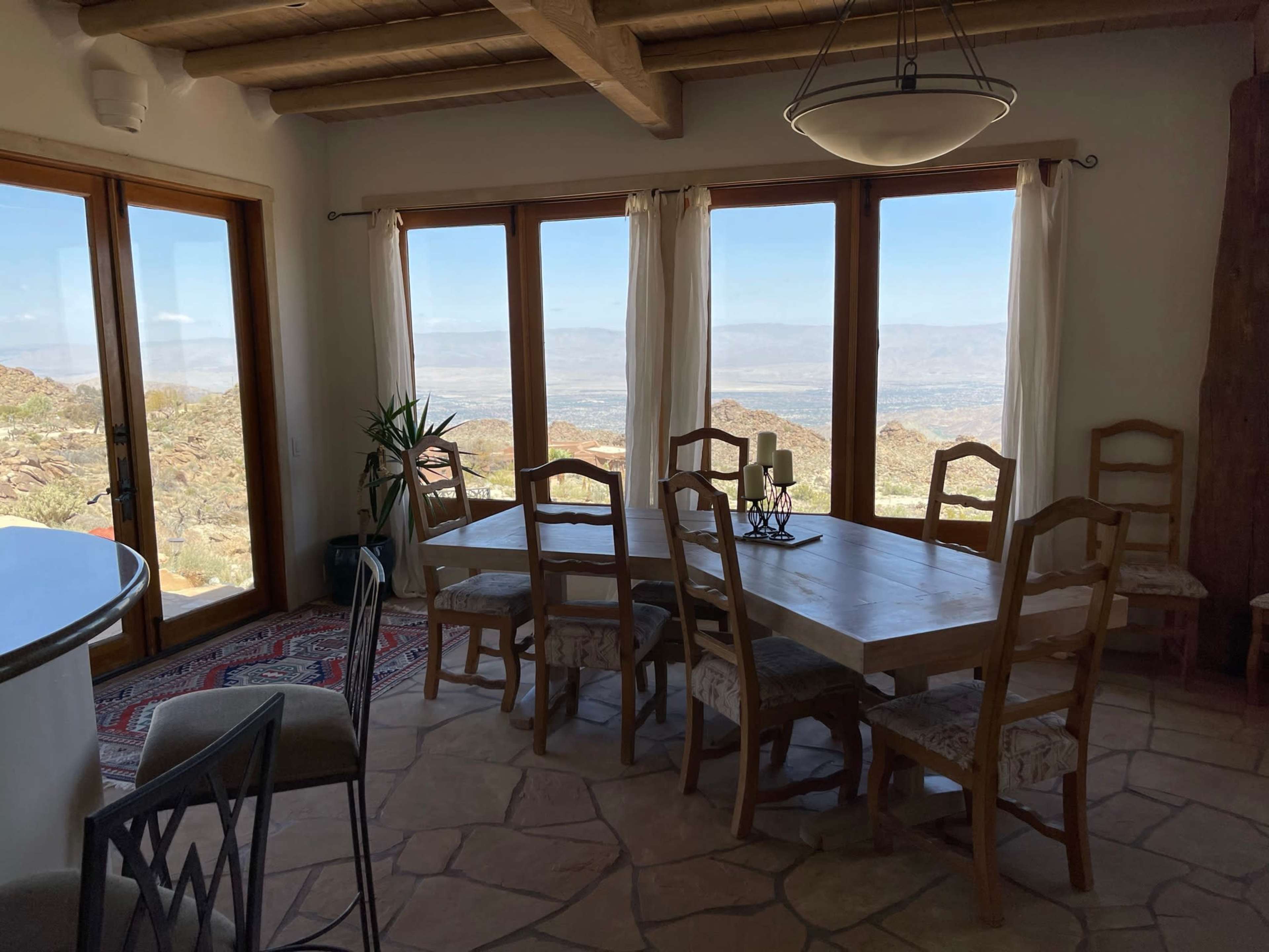 50-mile vista,  desert mountain home,  rustic interior, heavy timber ceilings, stone floors, with pool, hot tub - 45 mins from Palm Springs or Coachella site Image in , Mountain Center, CA
