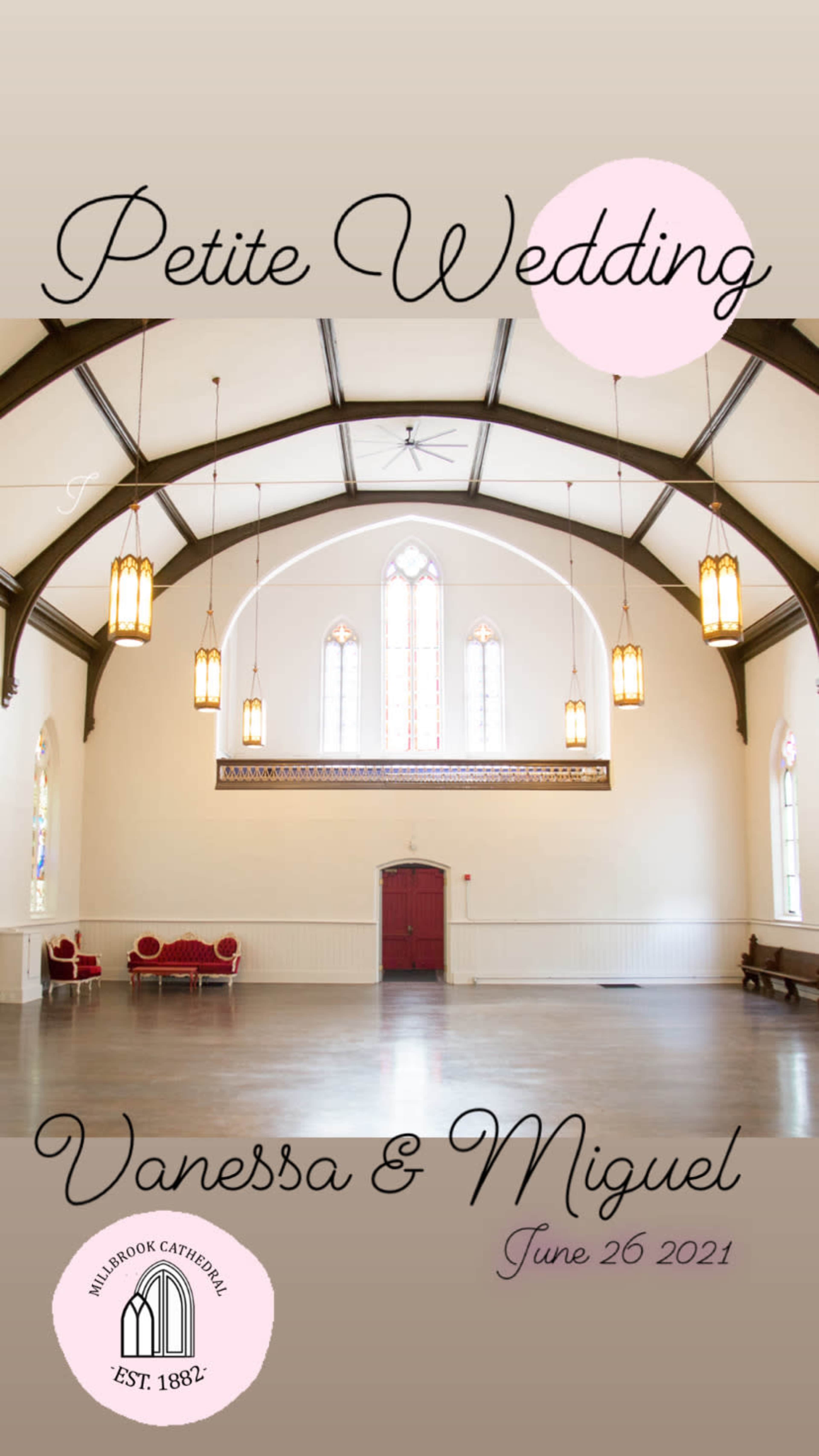 An empty hall with high ceilings, stained glass windows, and decorative lighting fixtures, alongside text announcing a wedding for Vanessa and Miguel.