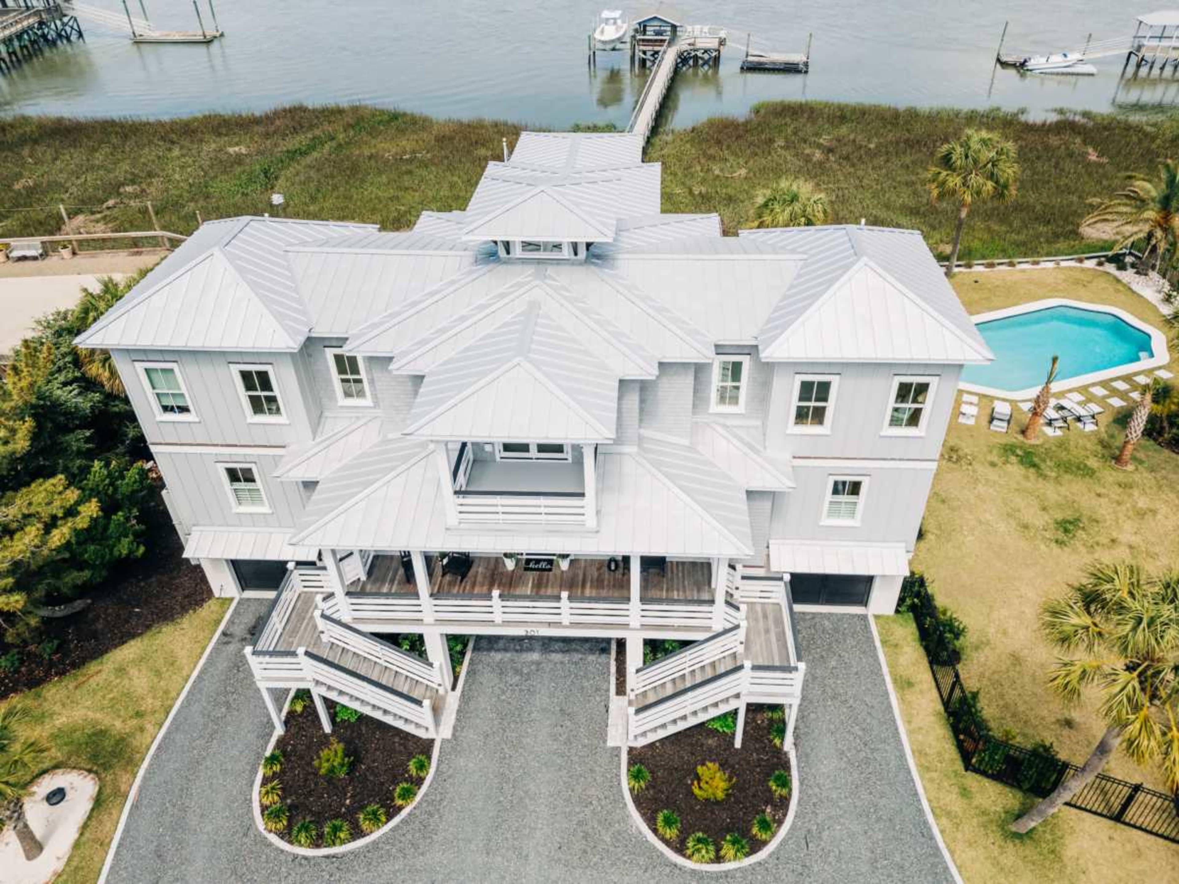 Beach style home on the water with dock and gorgeous sunsets. Image in Isle of Palms, Isle of Palms, SC