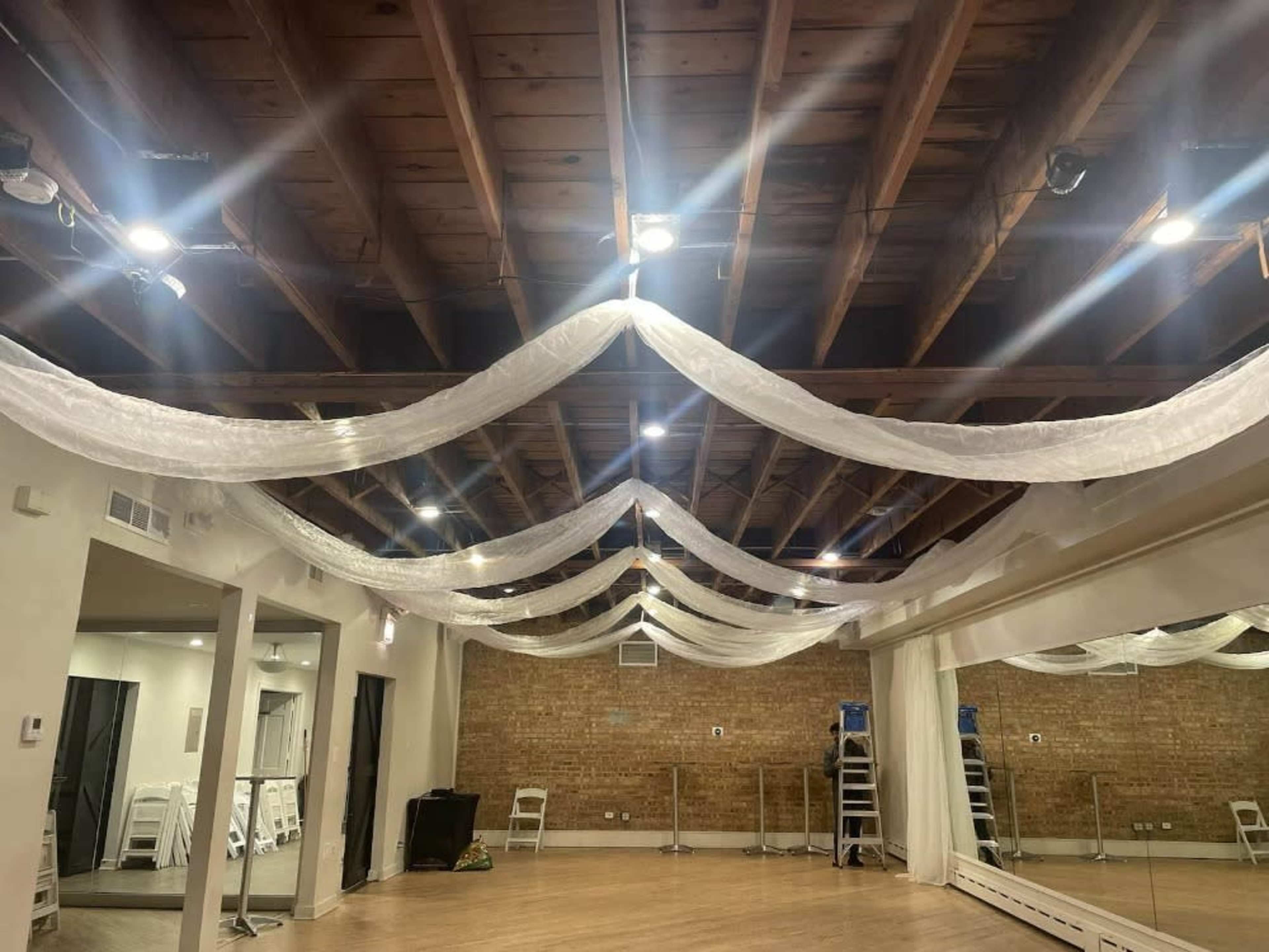 Ceiling drapes in Brick studio