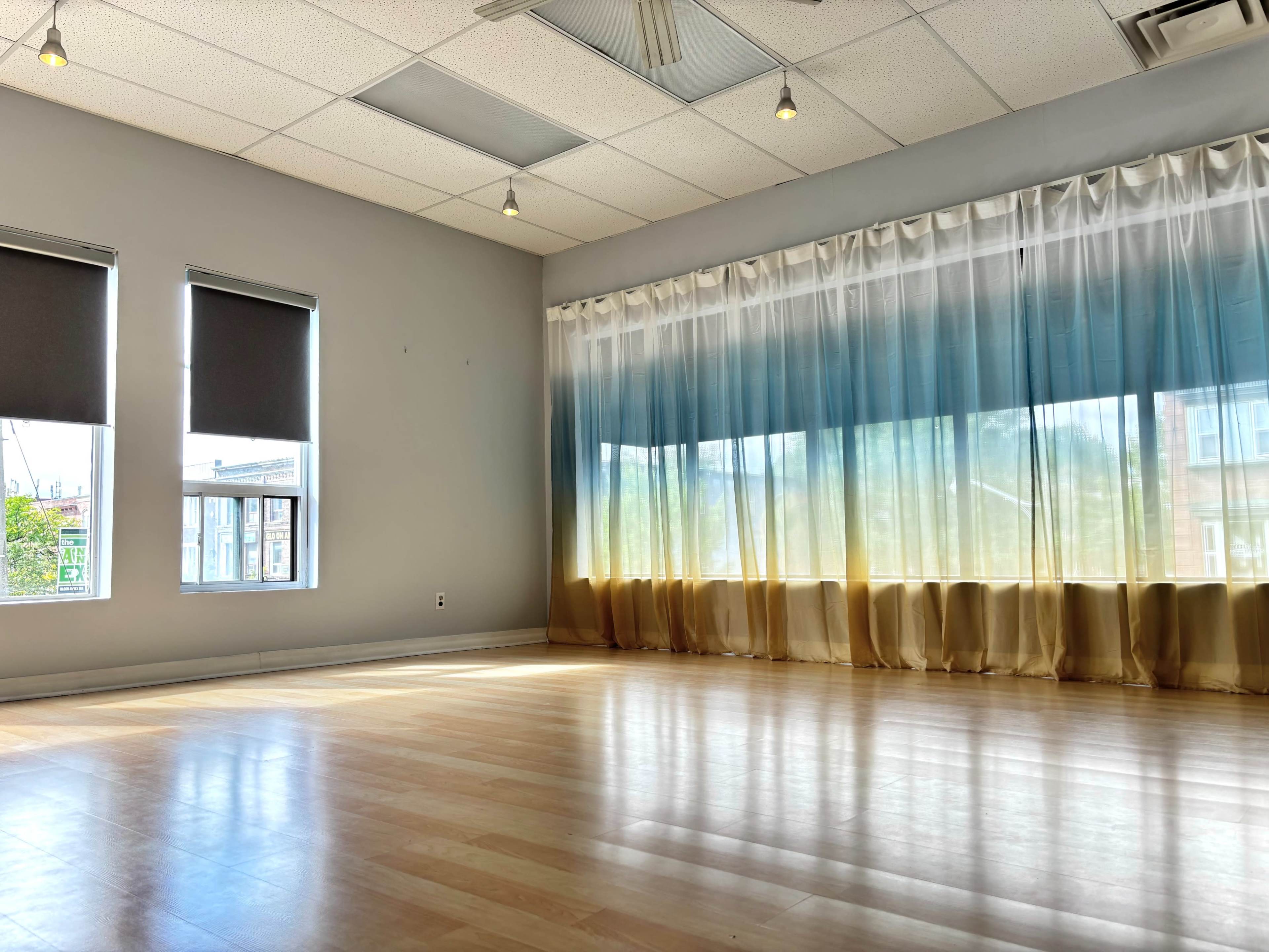 Sunny Dance & Yoga Studio with Ombré Curtains | Natural Light Haven Image in Harbord Village, Toronto, ON
