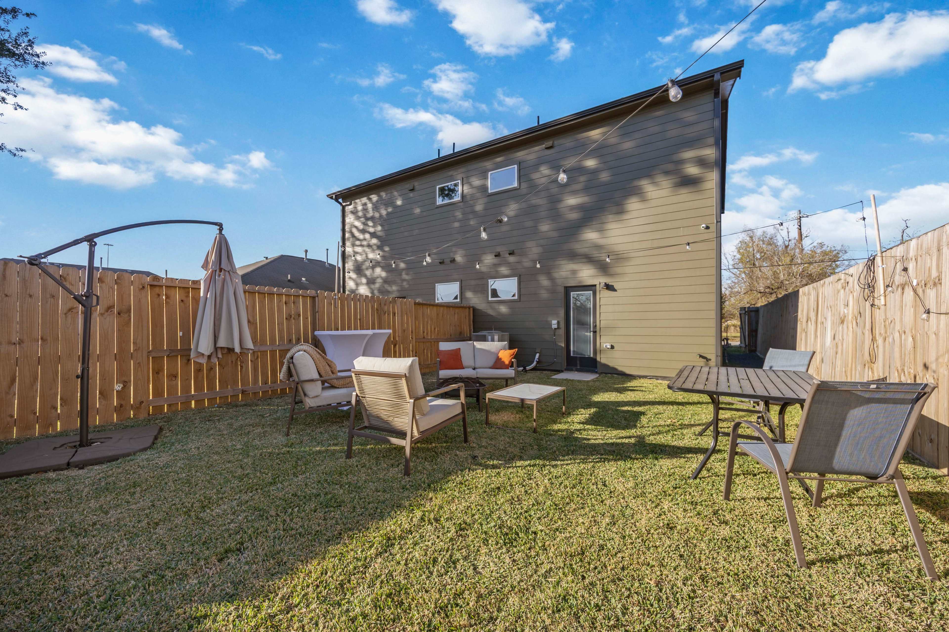 Fully Fenced Urban Upscale Backyard Romantic String light Space Image in Greater Fifth Ward, Houston, TX