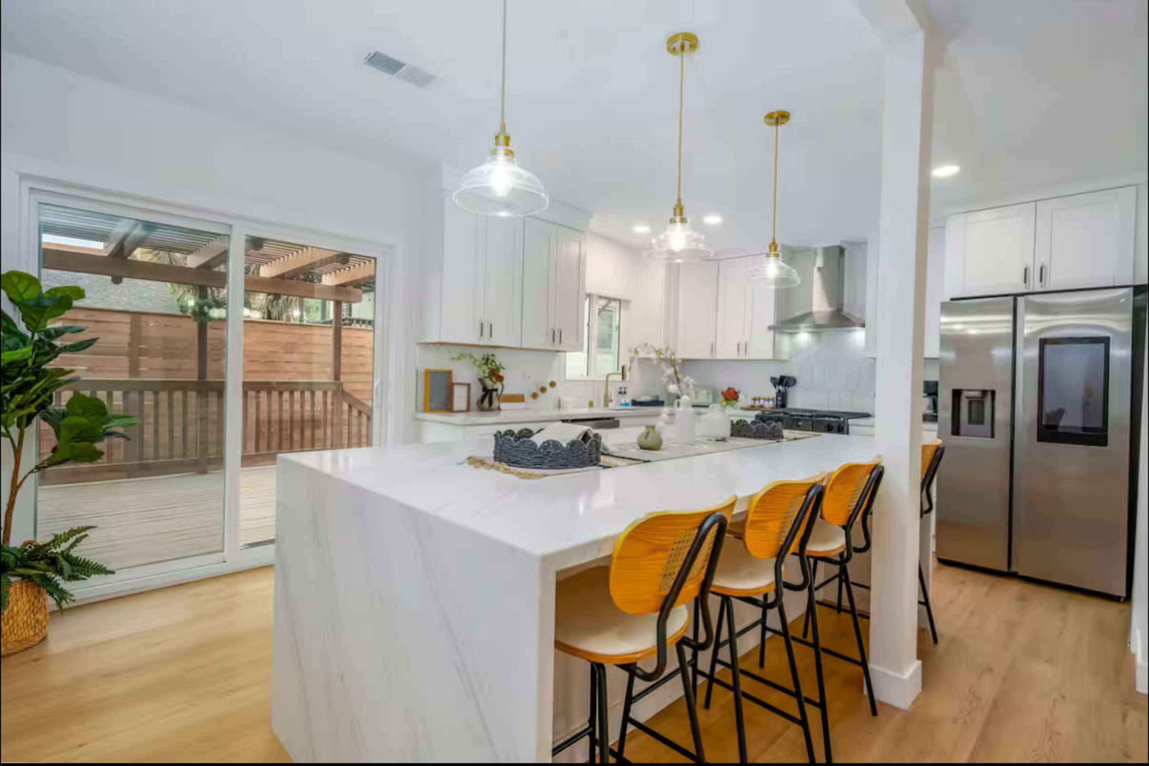 Bright, natural sunlight, open concept, ultra modern craftsman home and entertainers yard Image in North Park, San diego, CA