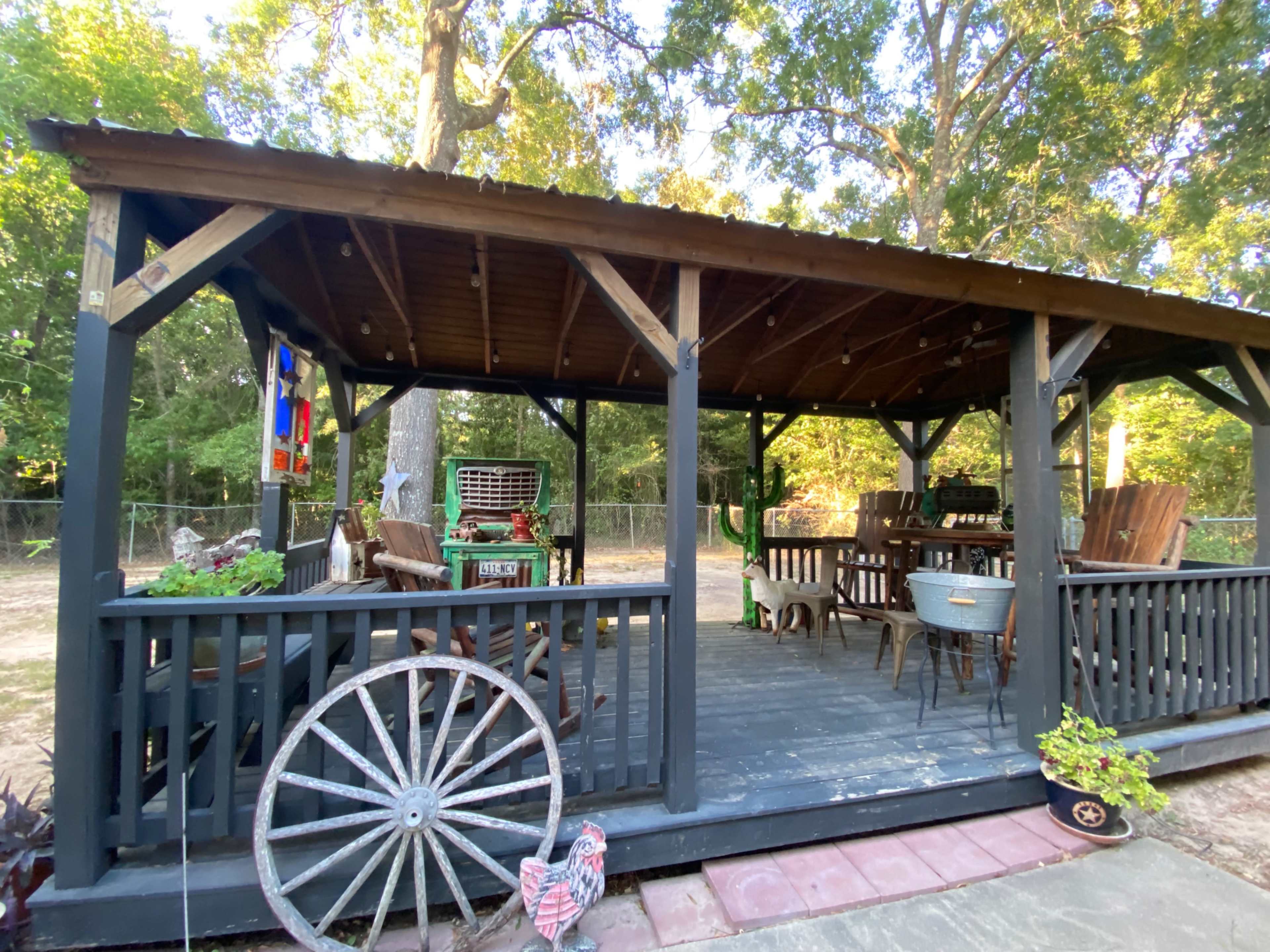 Lake area home with large gazebo and fenced backyard. Image in West Livingston, Livingston, TX