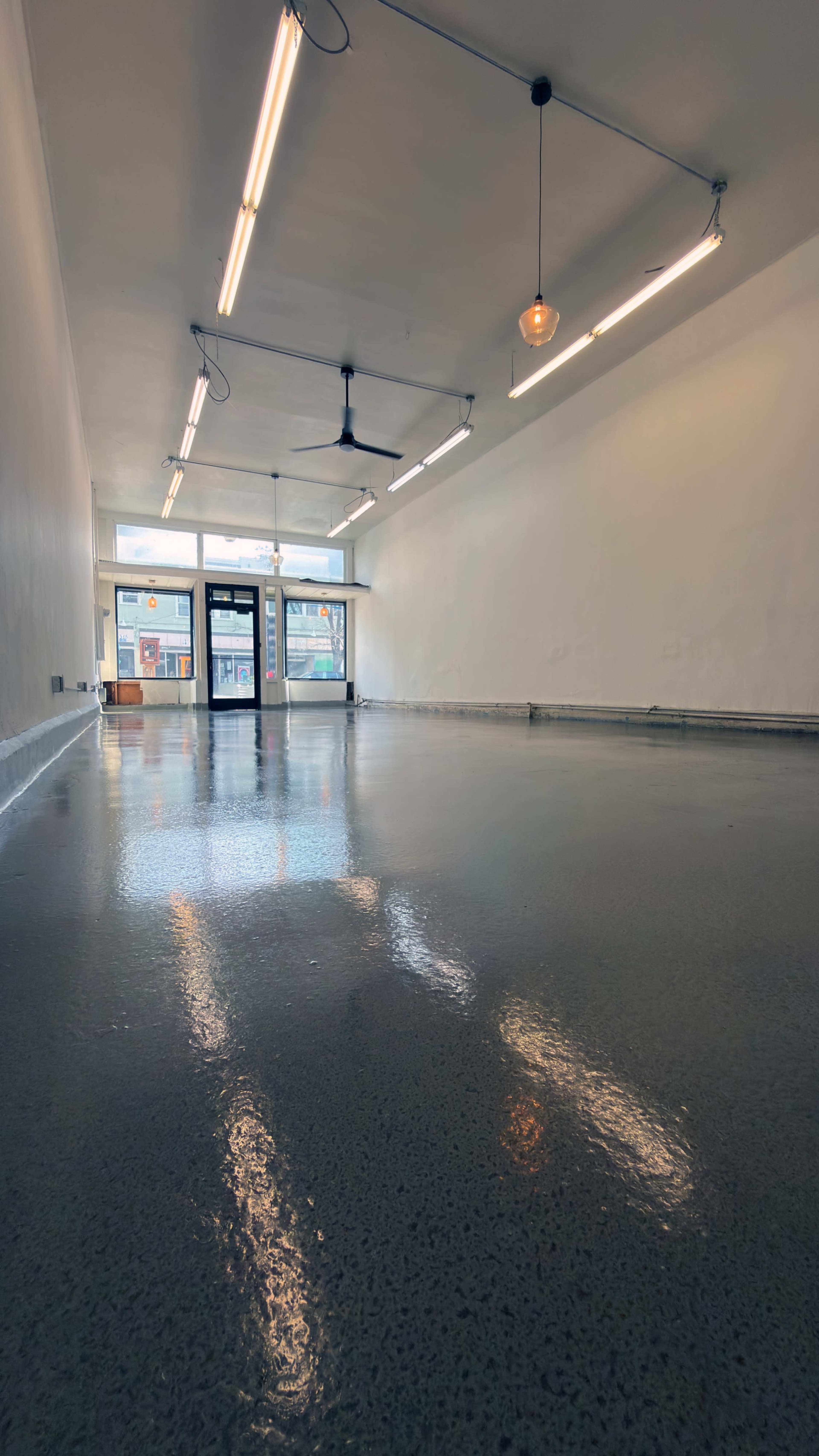 Bright Minimal Storefront Event Space with Polished Concrete Floors Image in , Oakland, CA
