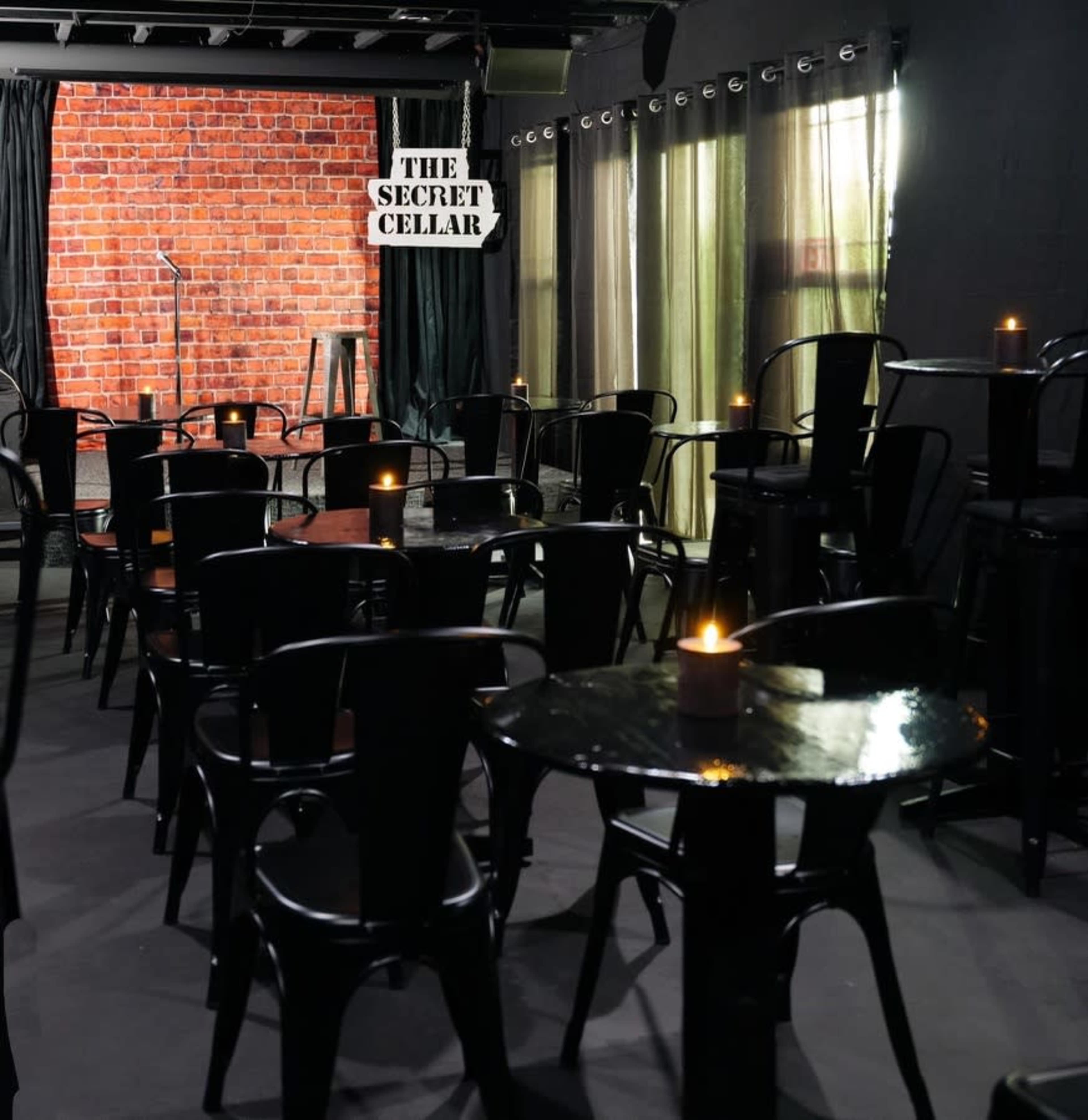 Secret speakeasy comedy club in suburban neighborhood that seats 52 Image in Aurora, Aurora, CO