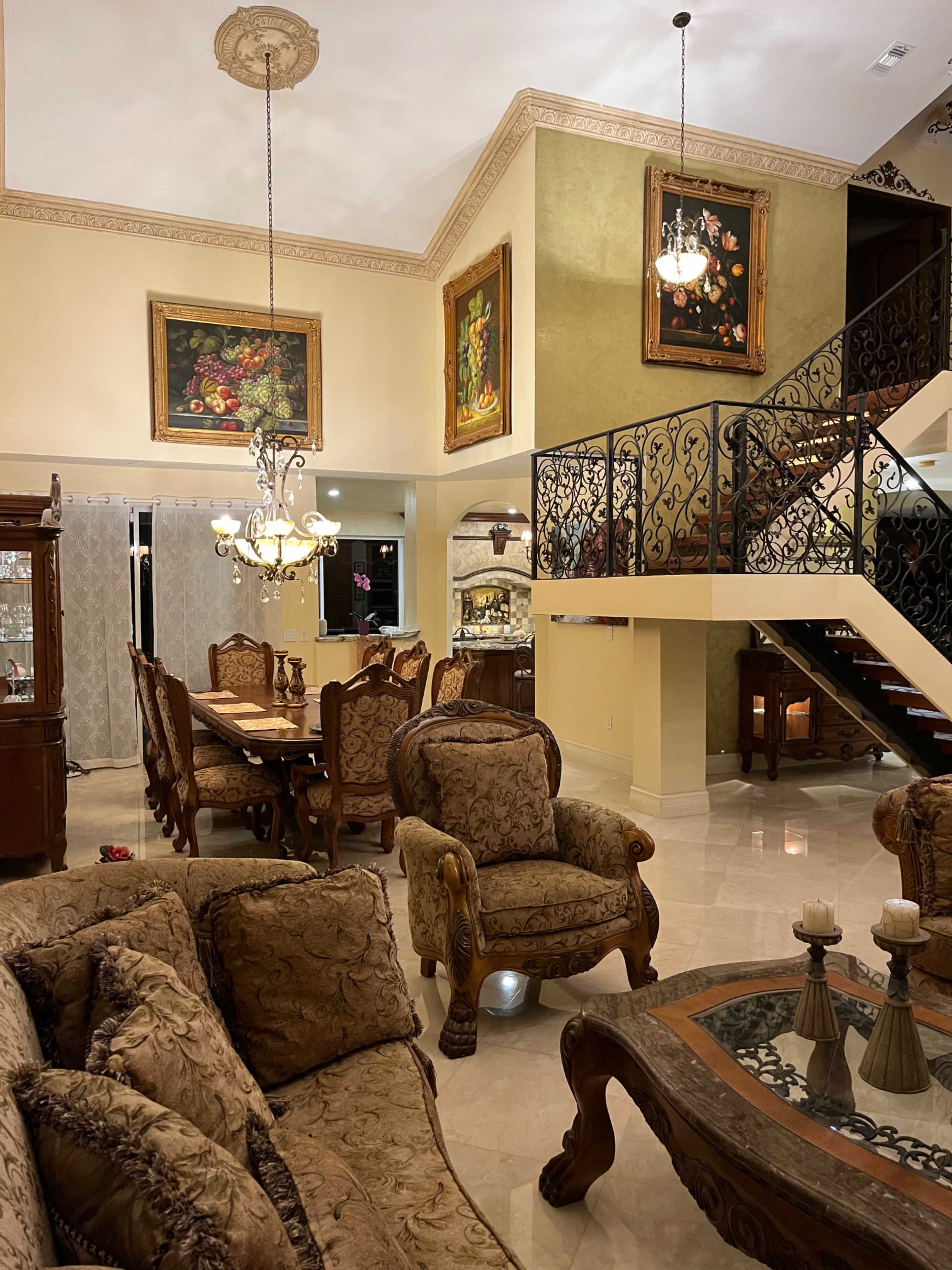 Elegant Mediterranean Style Home With Ornate Grand Staircase Image in West End, Miami, FL