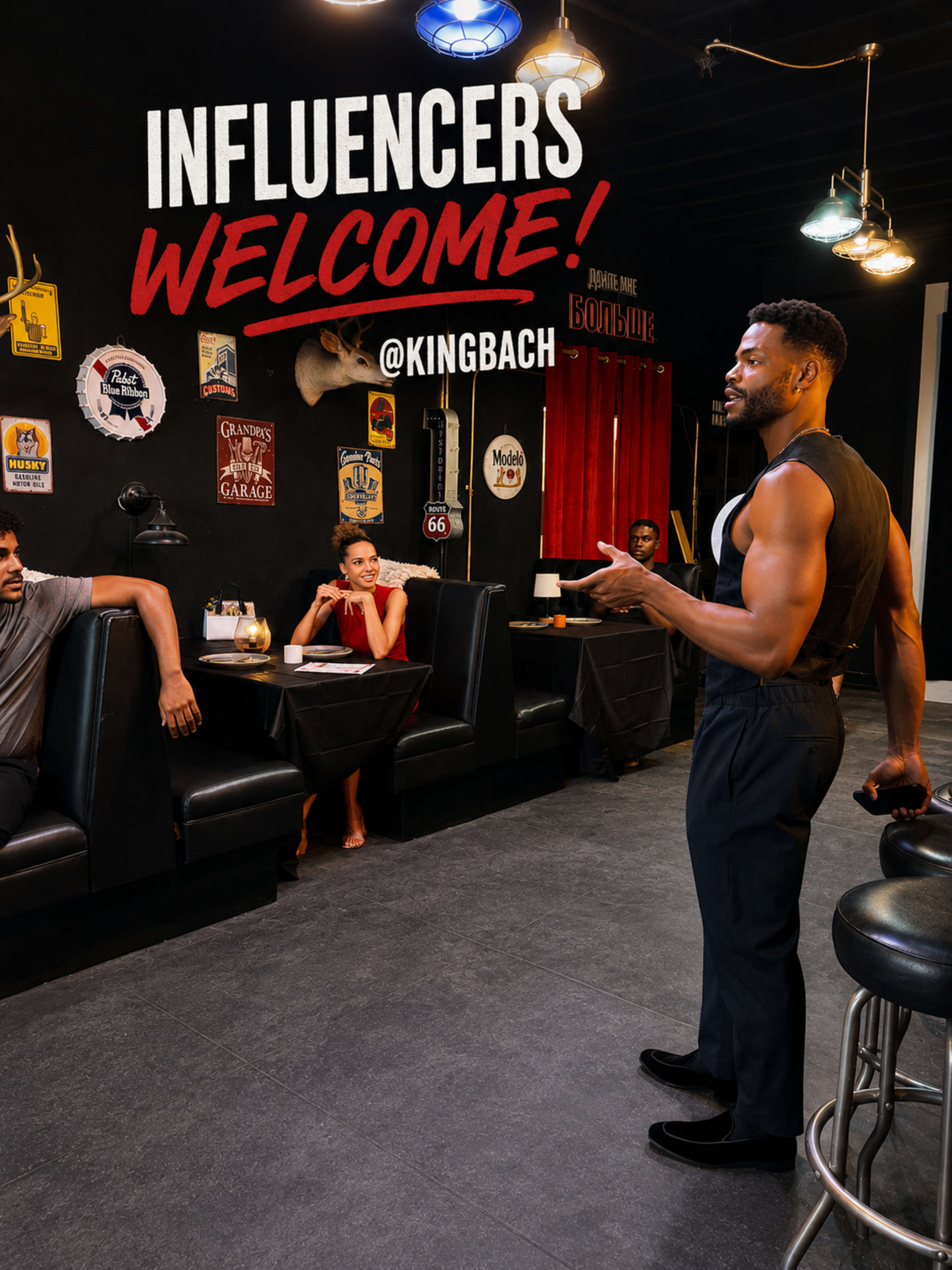 A man in a sleeveless shirt stands in front of a table where a woman and two men sit, with a backdrop featuring a "WELCOME" sign and various vintage decor.