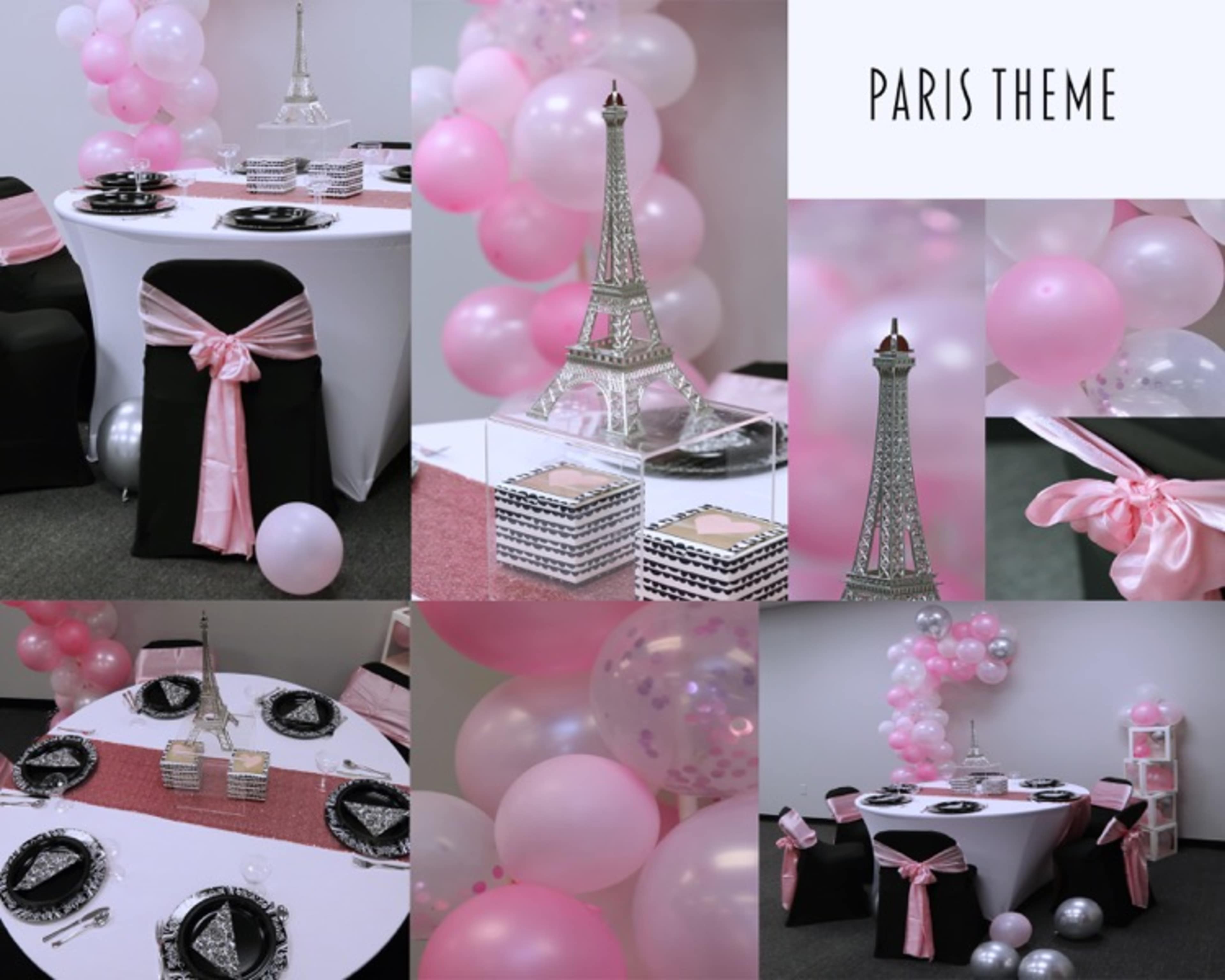 A Paris-themed event setup with black and pink decorations, including a table adorned with an Eiffel Tower centerpiece, elegant tableware, and balloons.