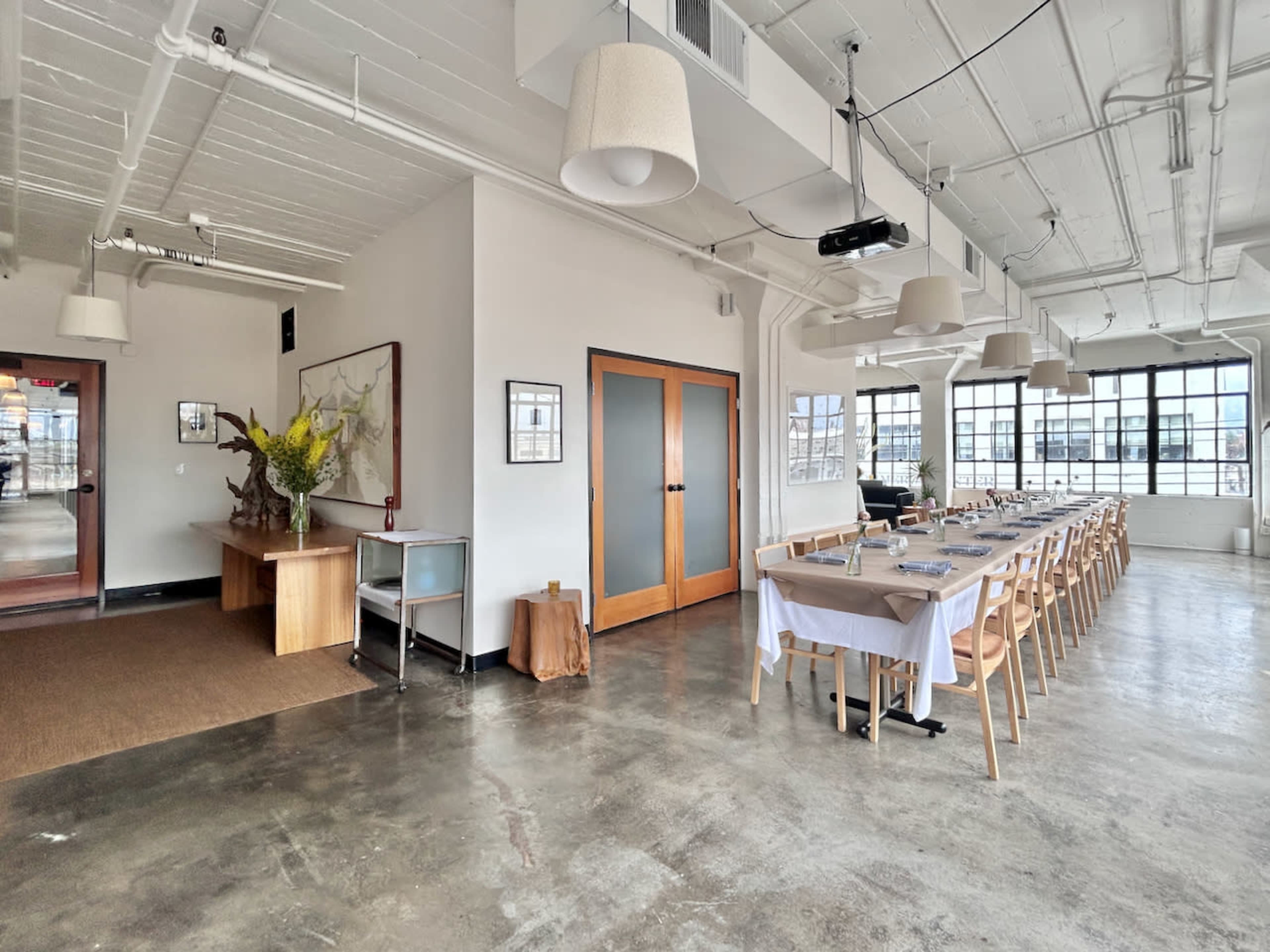 Elegant Industrial Space with Warm Lighting & Open Layout Image in Southeast Portland, PORTLAND, OR