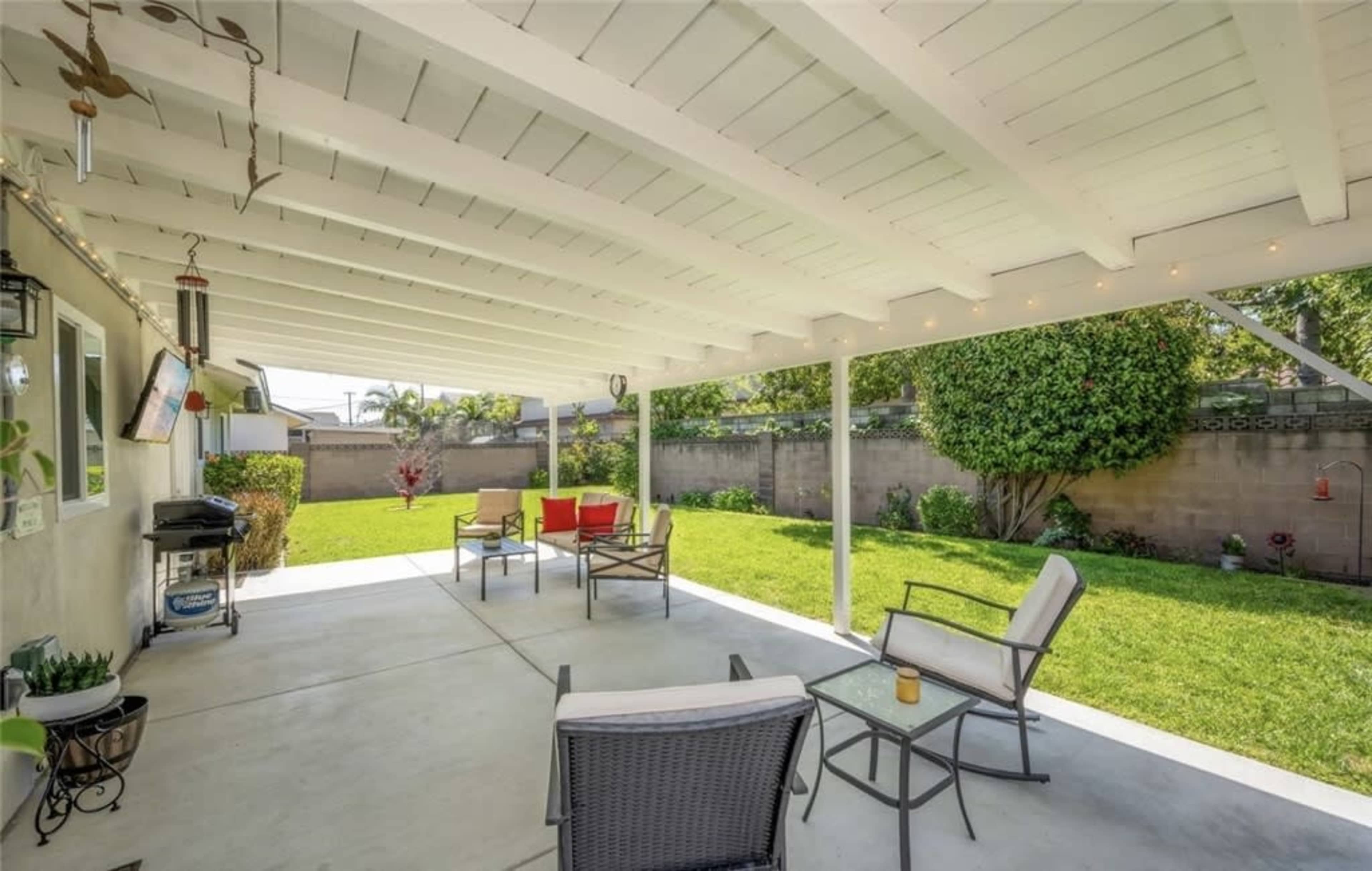 Spacious Charming Backyard with Patio Lights and Firepit Image in Garden Grove, Garden Grove, CA