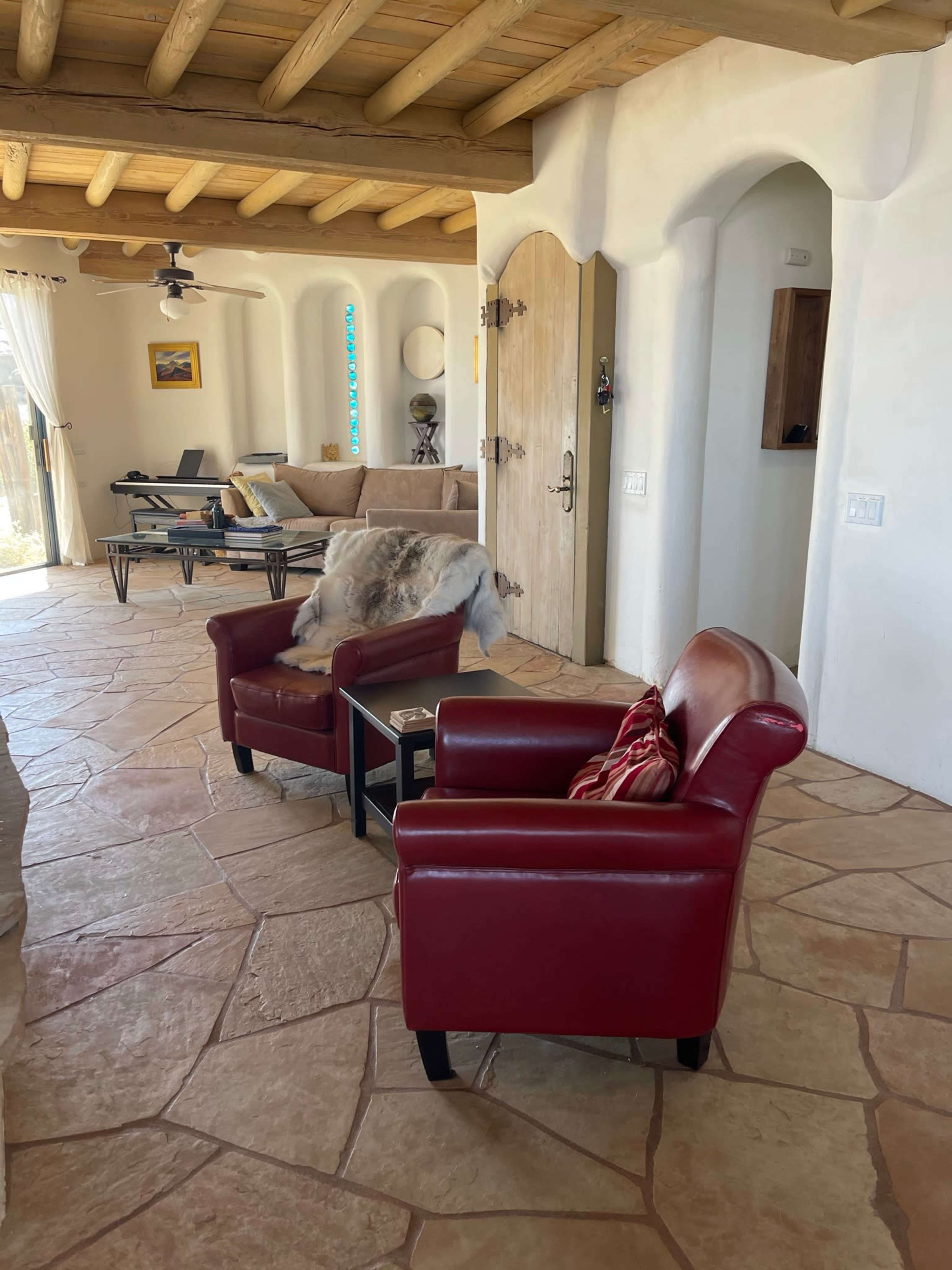 50-mile vista,  desert mountain home,  rustic interior, heavy timber ceilings, stone floors, with pool, hot tub - 45 mins from Palm Springs or Coachella site Image in , Mountain Center, CA