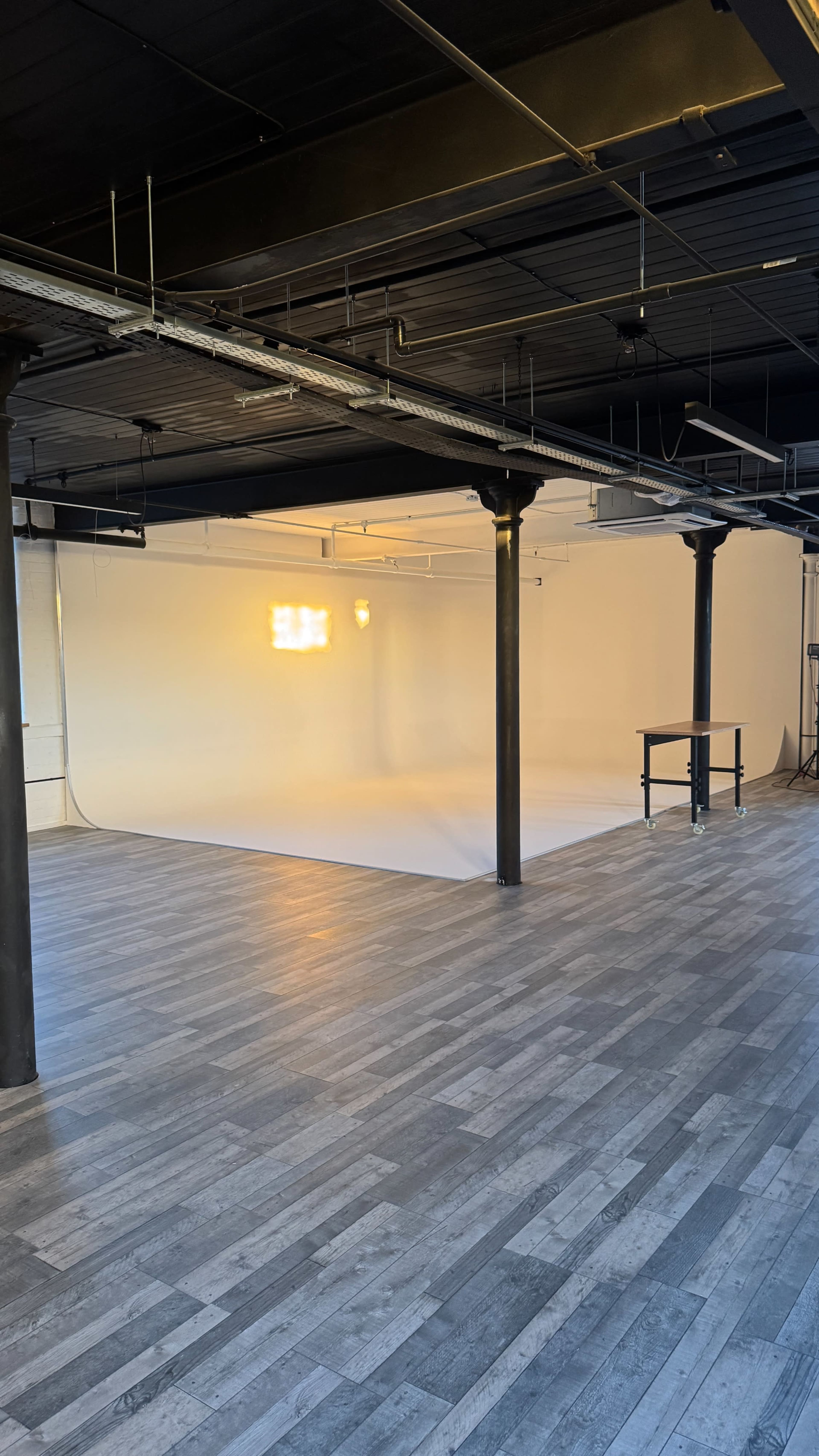Photo and Video studio with Infinity Cove Image in Central Retail District, Manchester, ENG