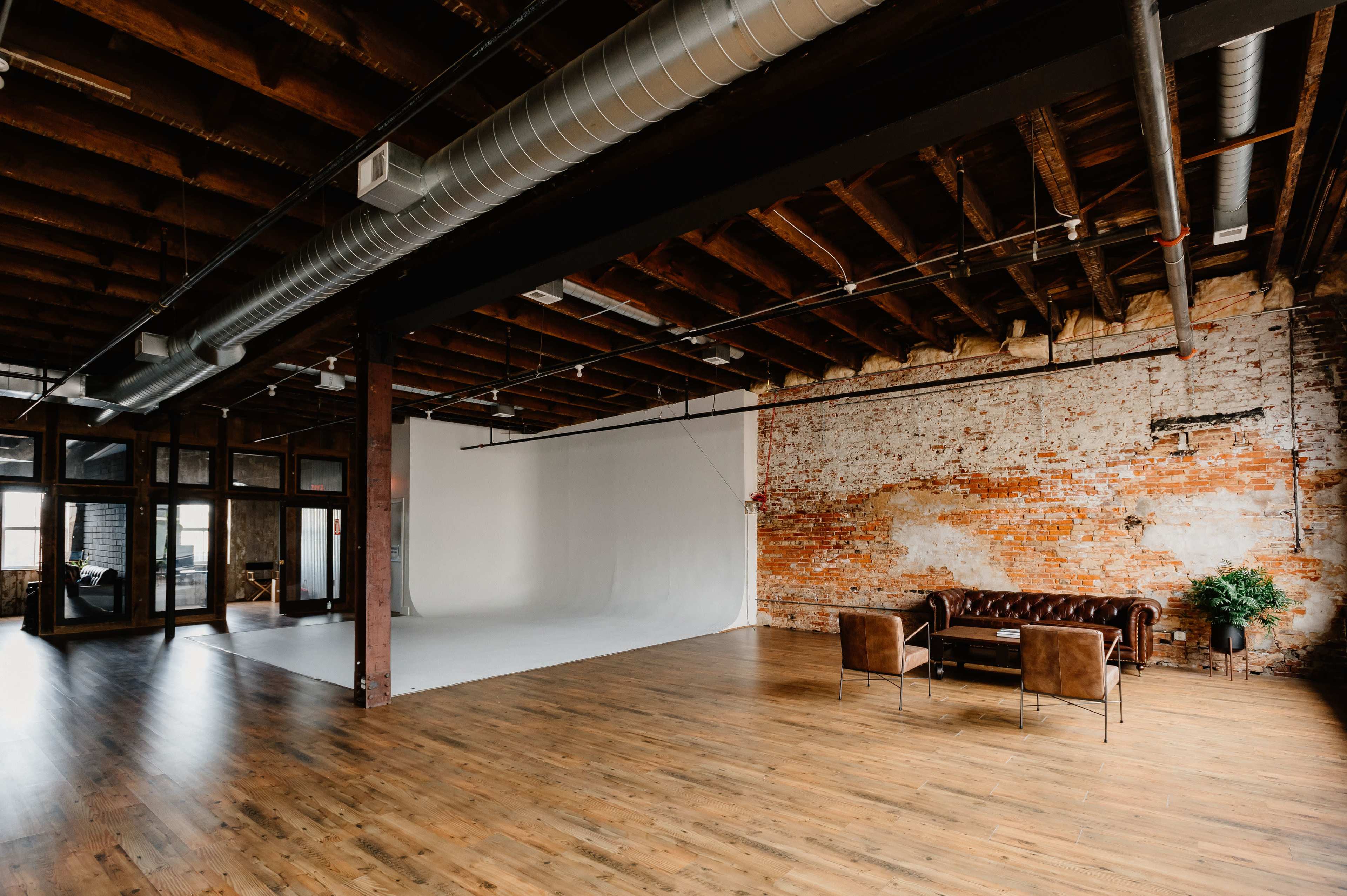 Downton Industrial Loft. Exposed Brick and Natural Light Image in Wilmington, Wilmington, DE