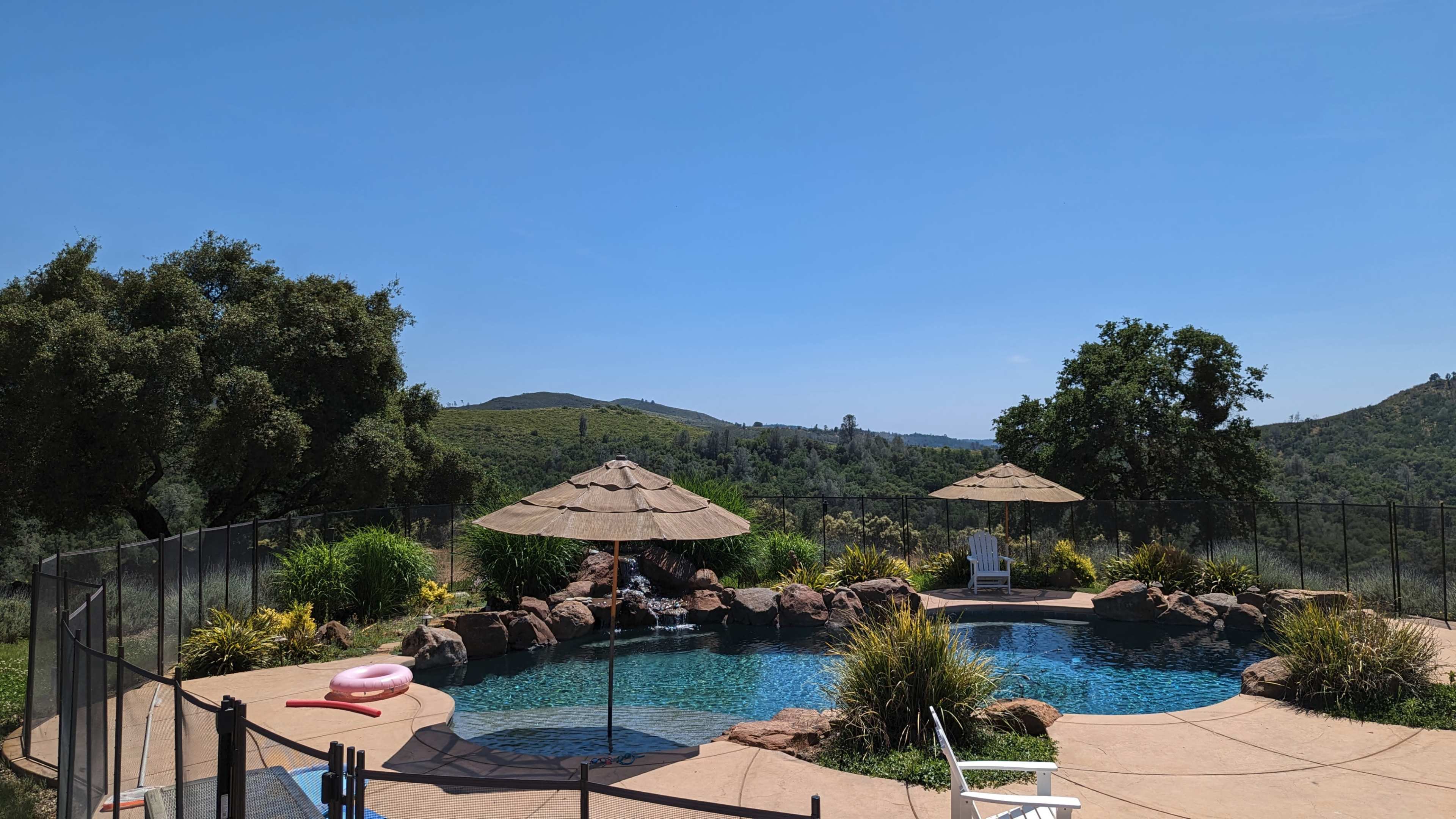 Upscale Pool with Waterfall in Secluded Hilltop Estate with Views Image in , Pilot Hill, CA