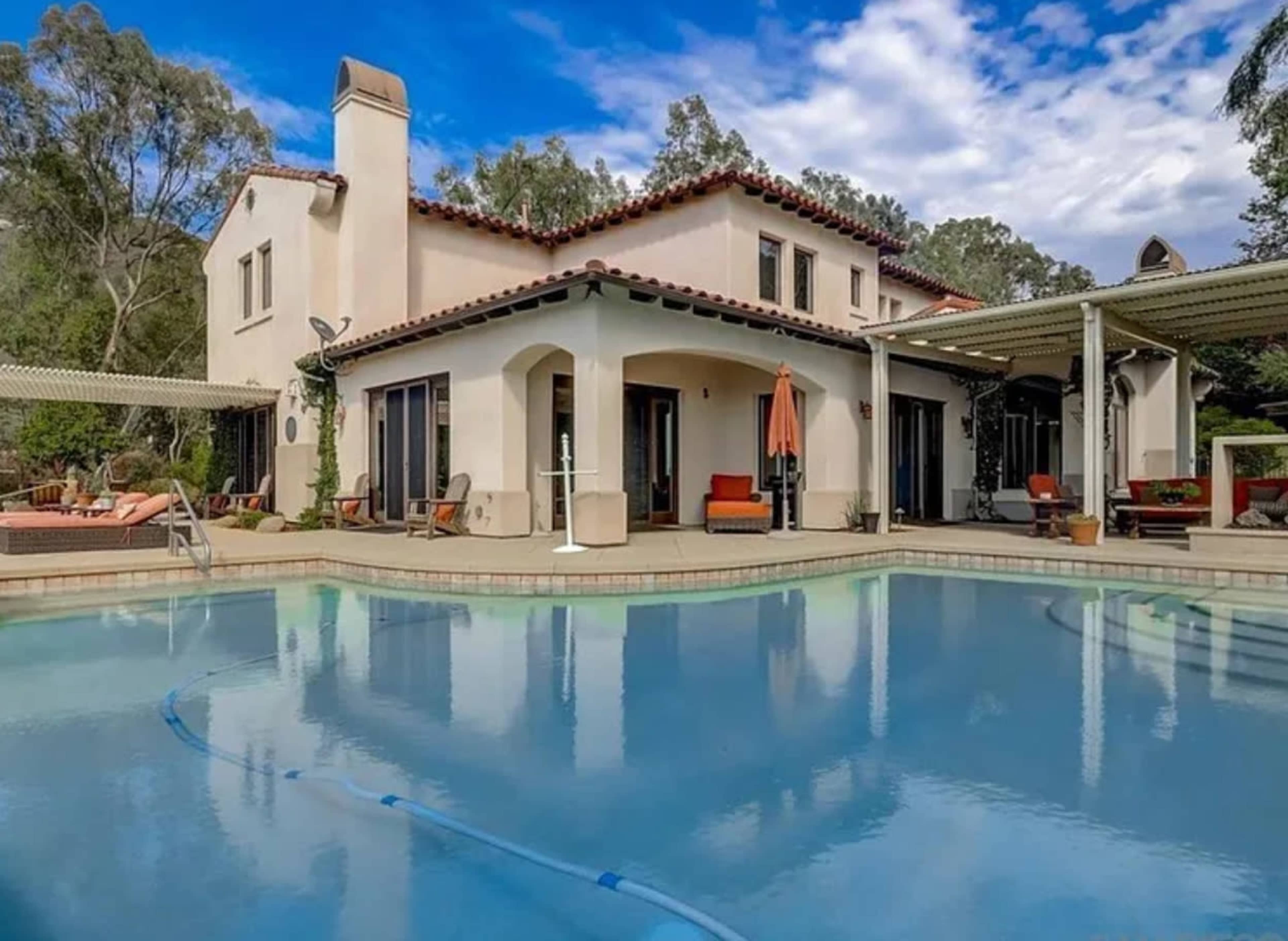 Modern Outdoor Pool Area with Golden Hour Views Image in Hidden Meadows, Escondido, CA