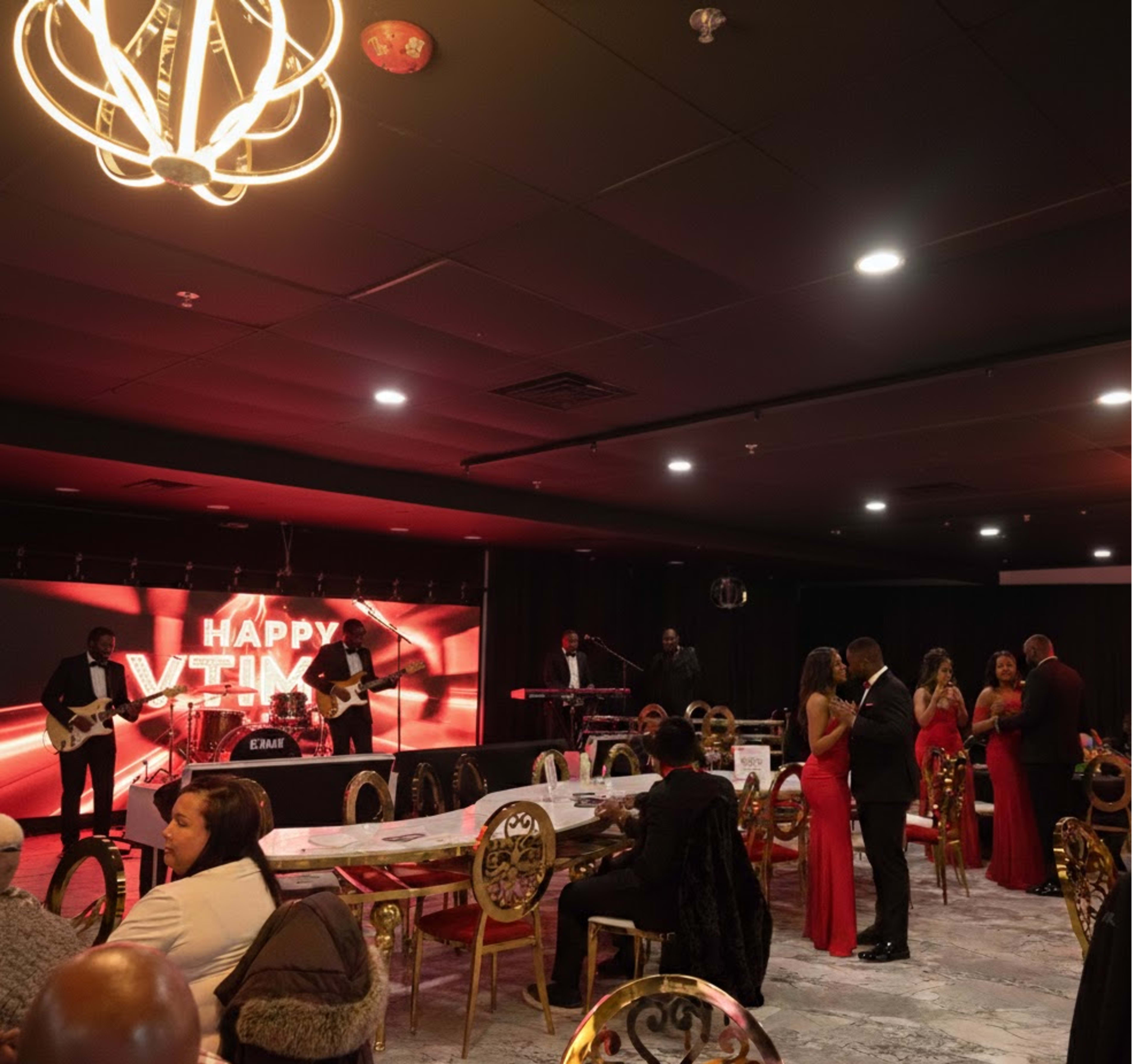 A party scene features guests in formal attire celebrating with a live band, evoking a festive atmosphere.