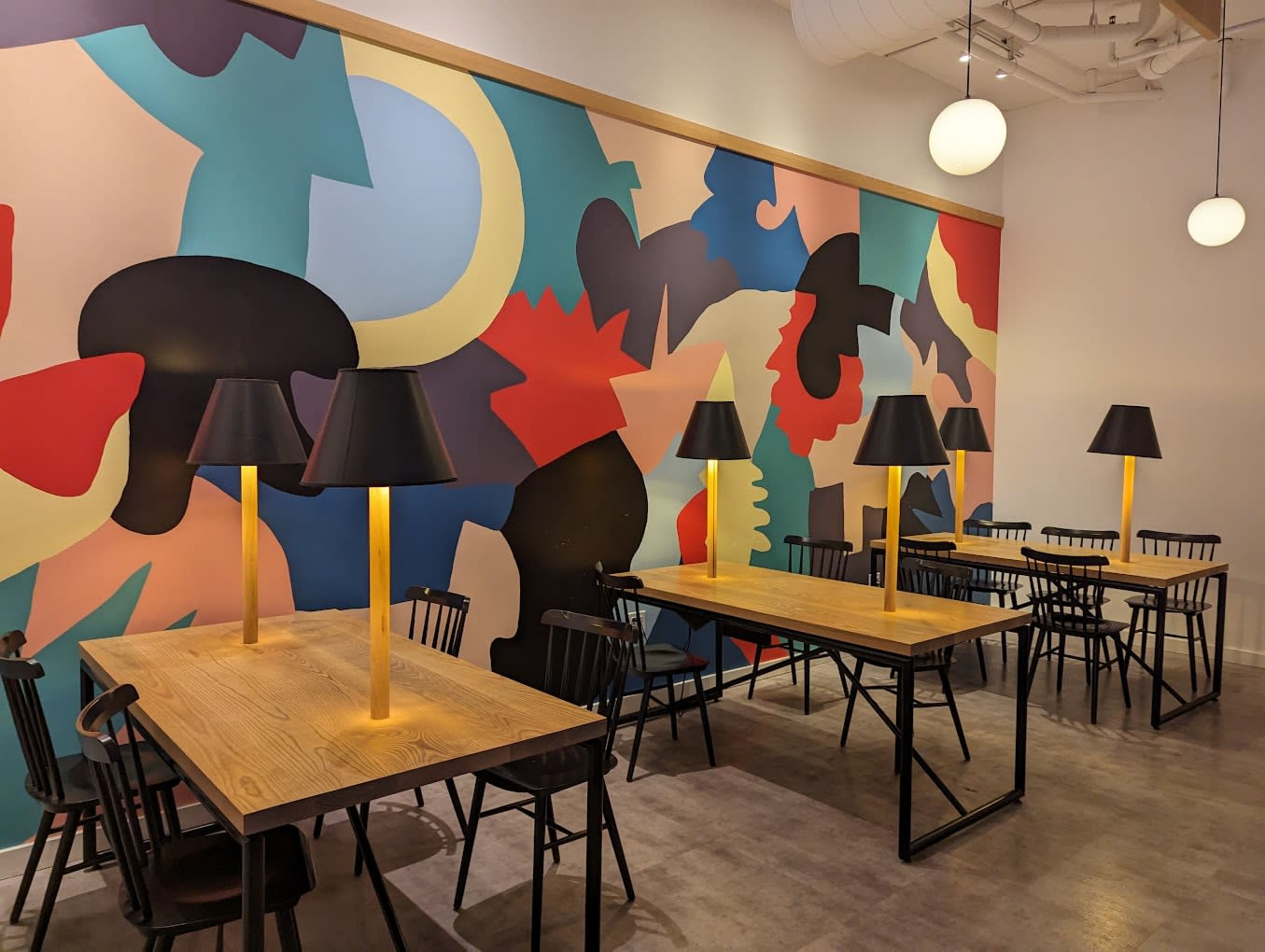 This cafe displays a great mix of a industrial and modern feel to it, making it a perfect place to relax and hangout, whilst also being a great place be productive and get things done. The cafe is located in a diverse area with homes and schools nearby, but it also consists of a city enviornment, along with the light rail being a 2 minute walk away. Lastly, best of all the coffee/staff/community is amazing. Image in Roosevelt, Seattle, WA
