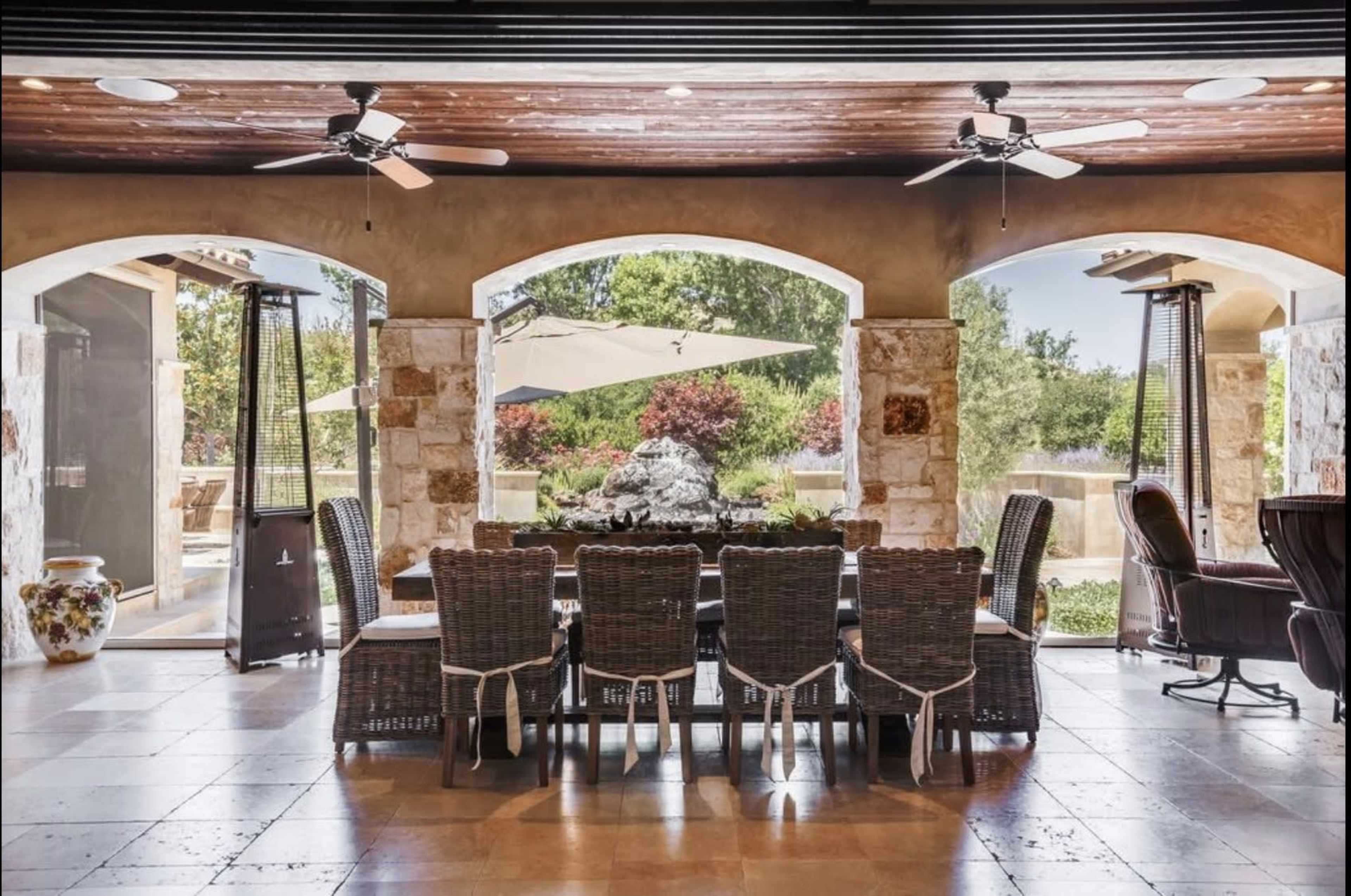 Large Tuscany outdoor with patio overlooking vineyards, mountains and lakes. Image in San Martin, San Martin, CA