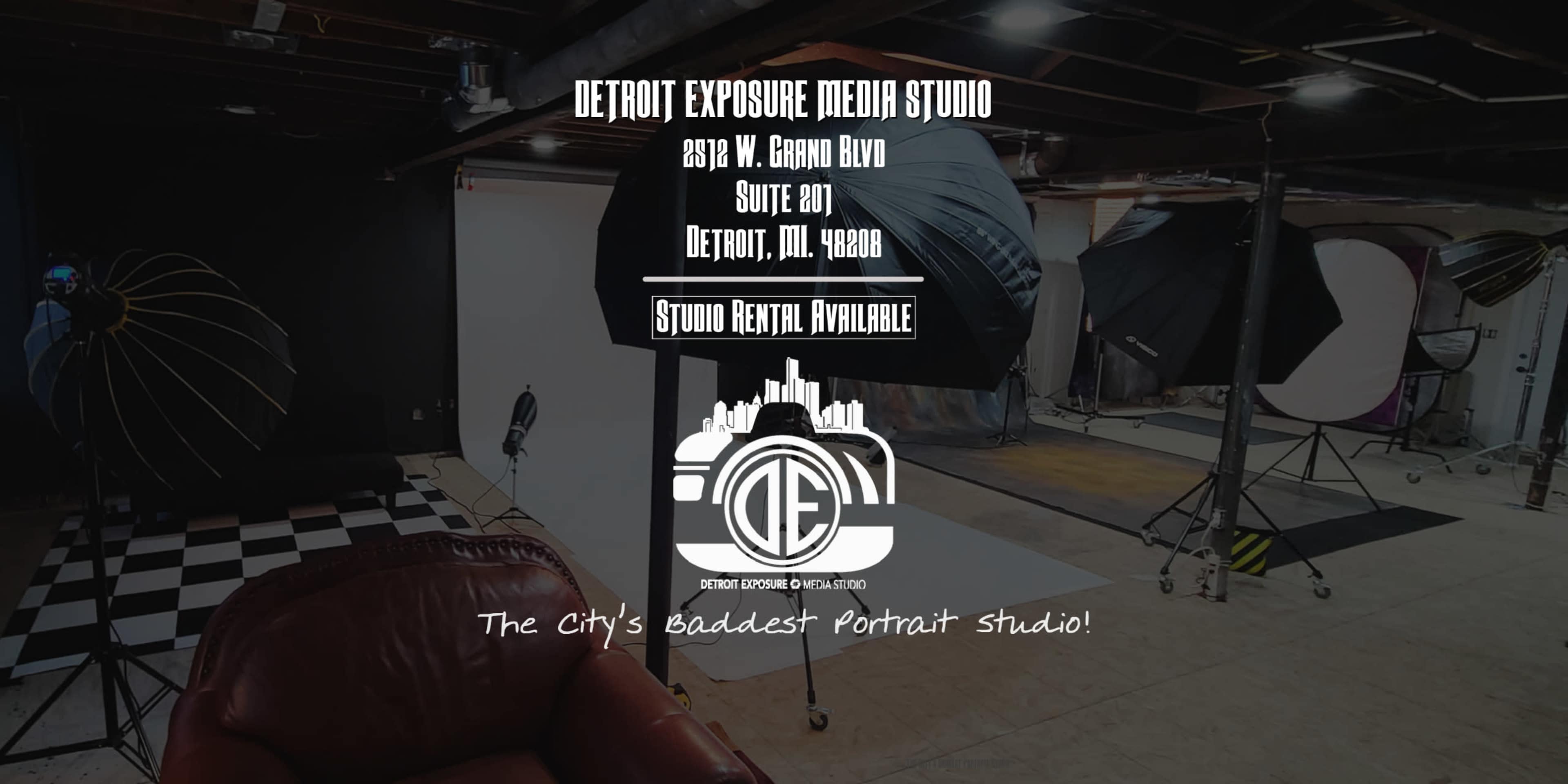 A photography studio setup with various lighting equipment, backdrops, and a checkered floor.