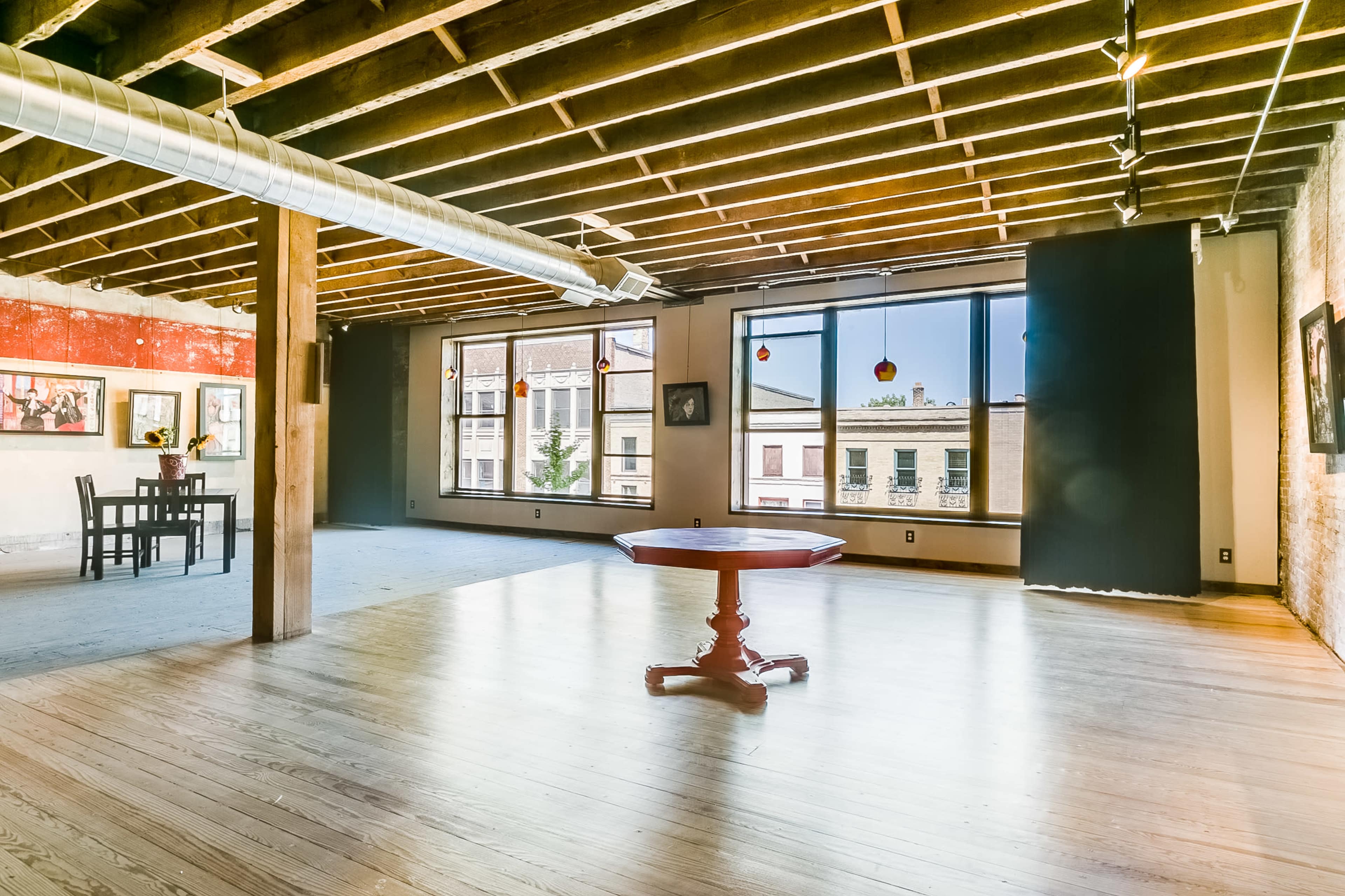 Chic, historic  loft with natural light and artistic charm. Image in Racine, Racine, WI