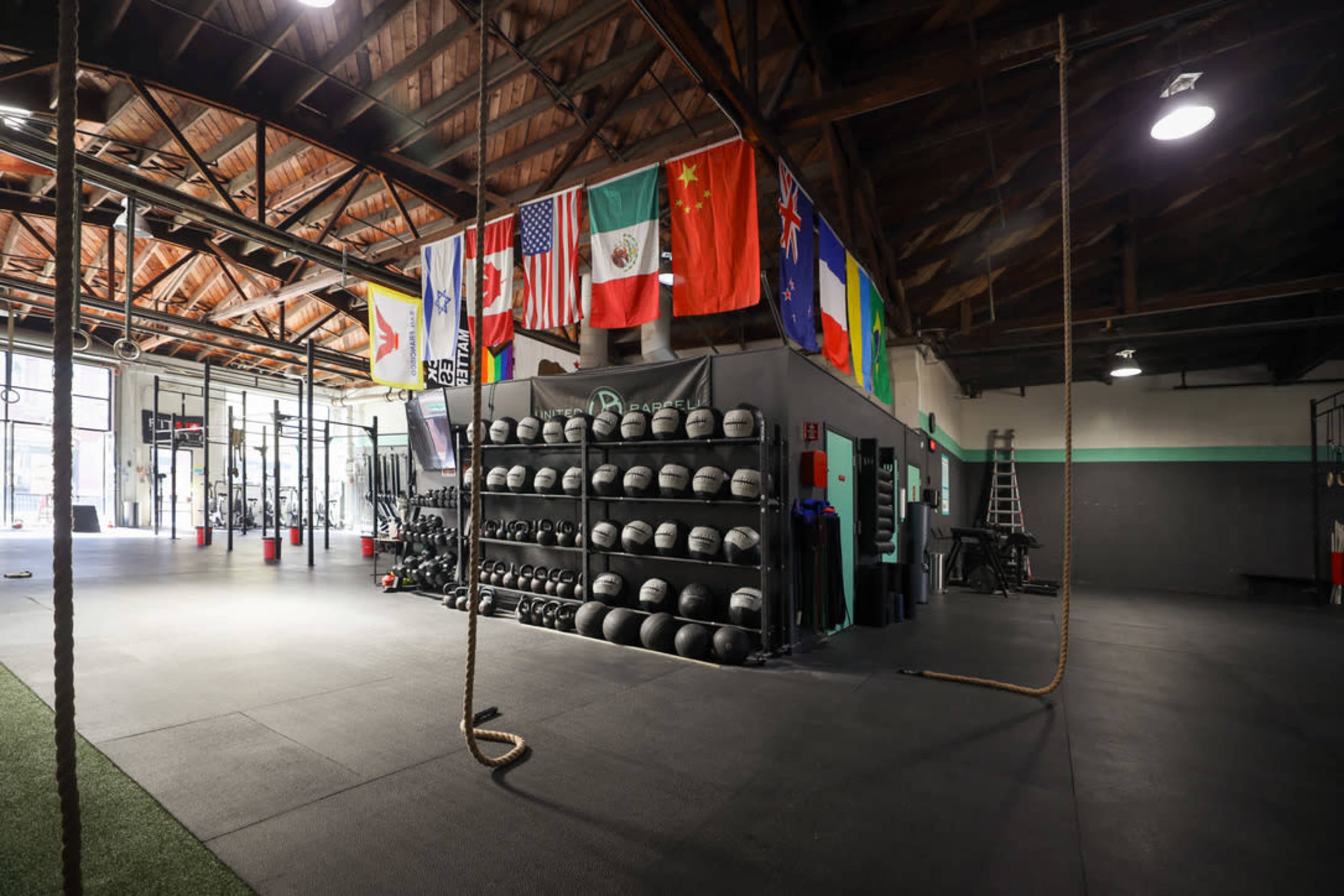 Dramatic historic warehouse gym in SOMA Image in China Basin, San Francisco, CA