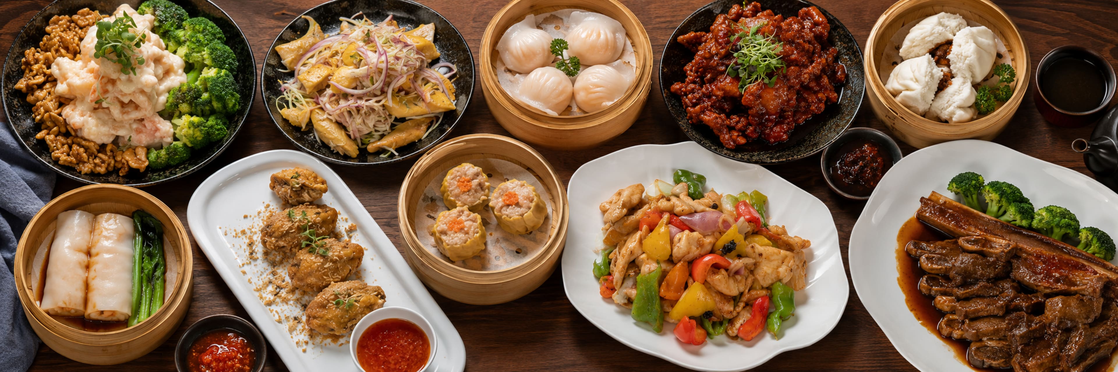 The image displays an array of Asian dishes, including dumplings, chicken, seafood, and vegetables, arranged on wooden tables.