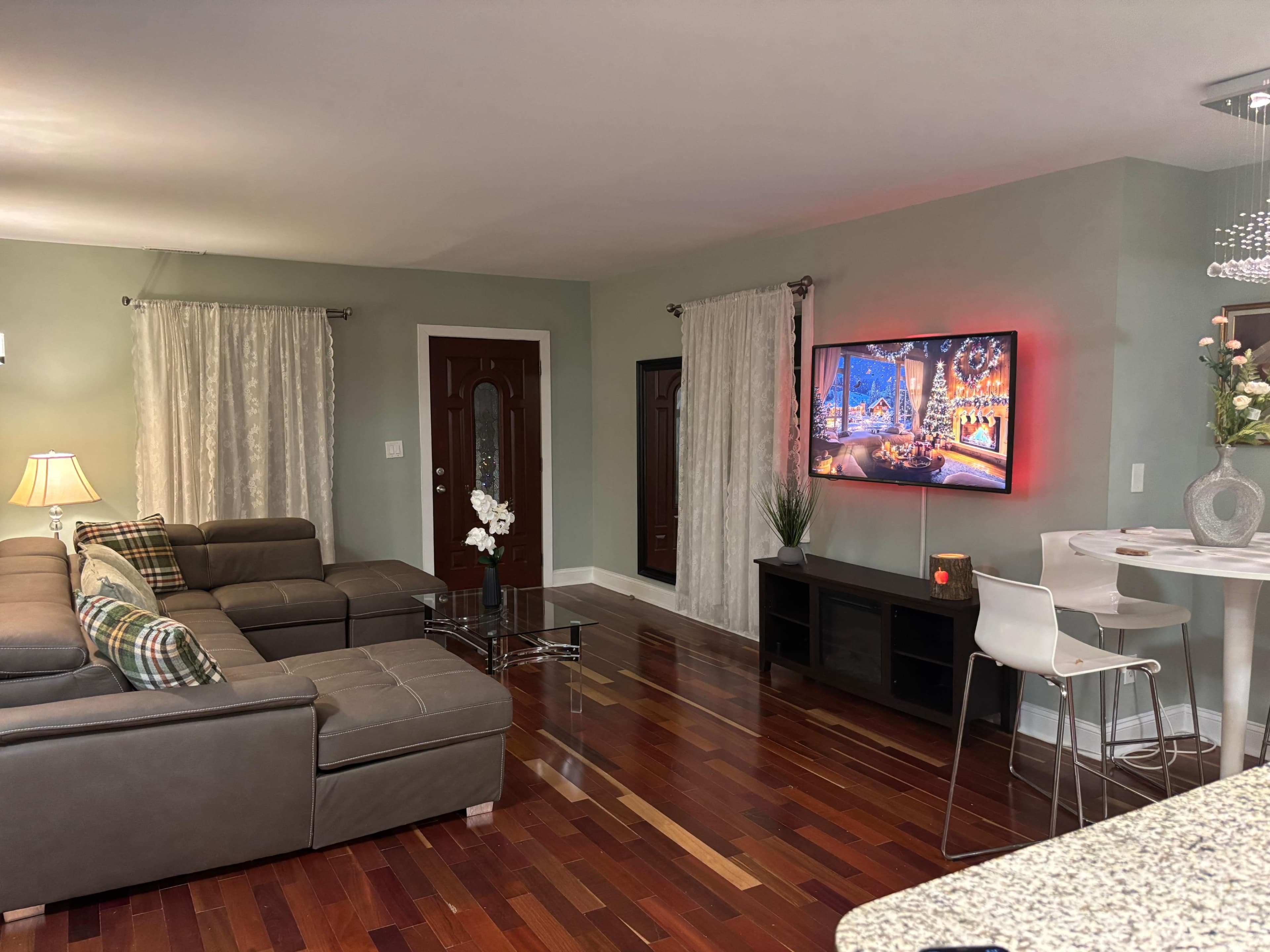 Urban and Artsy Open Floor Living Room and Kitchen Space with Great Natural light Image in Riverdale Park, Riverdale, MD